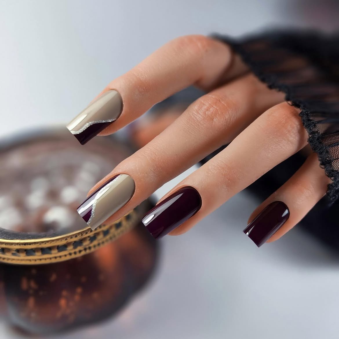 Glossy Burgundy And Taupe Nails With Silver Swirls