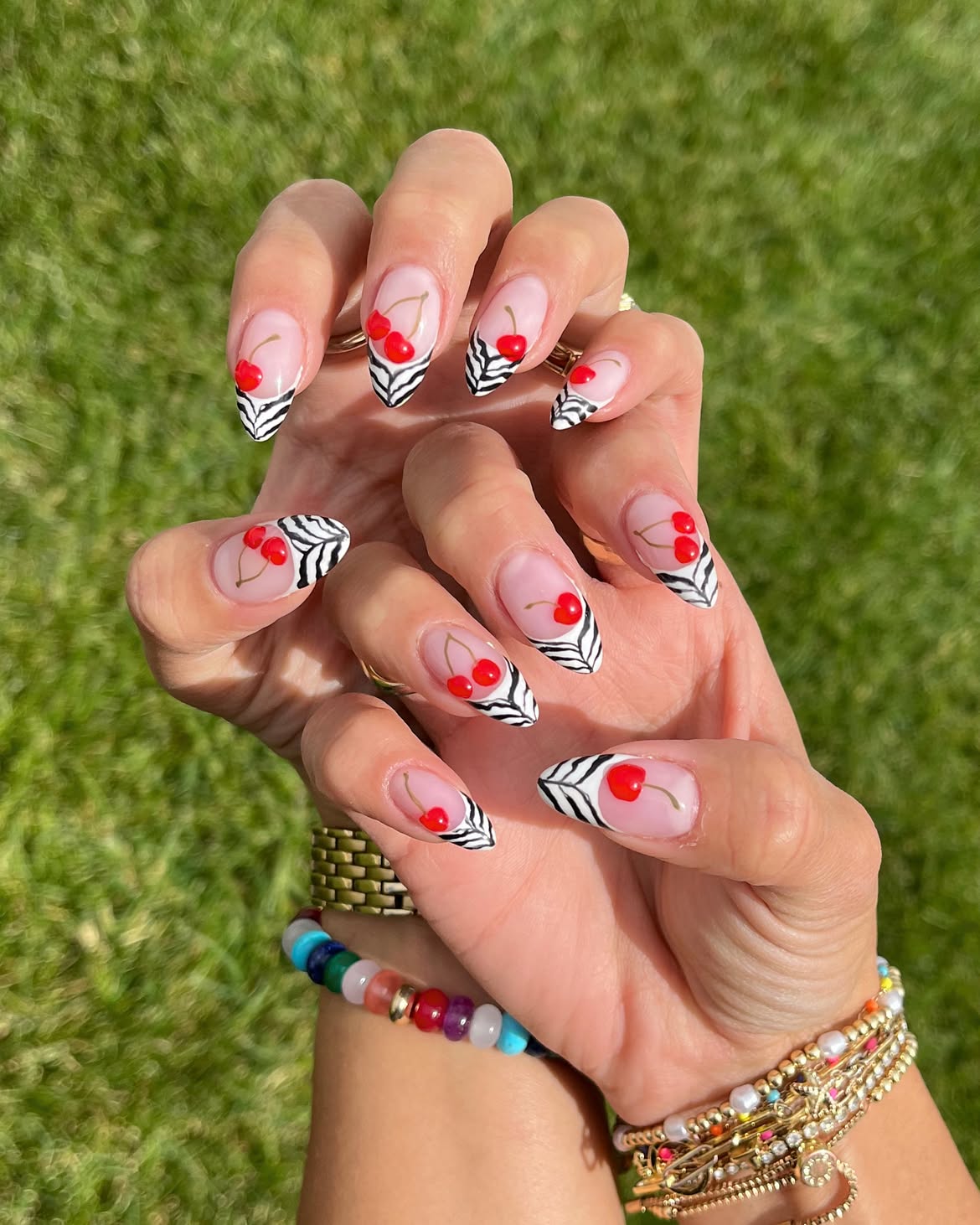 Glossy Cherry French Tips with Zebra Accent