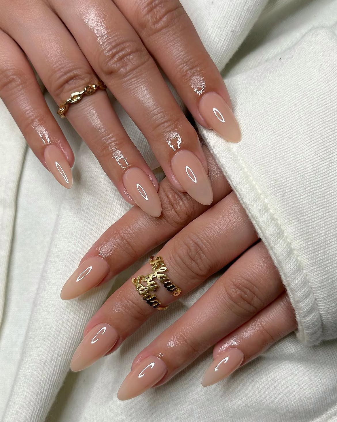 Glossy Milky Nude Almond Nails