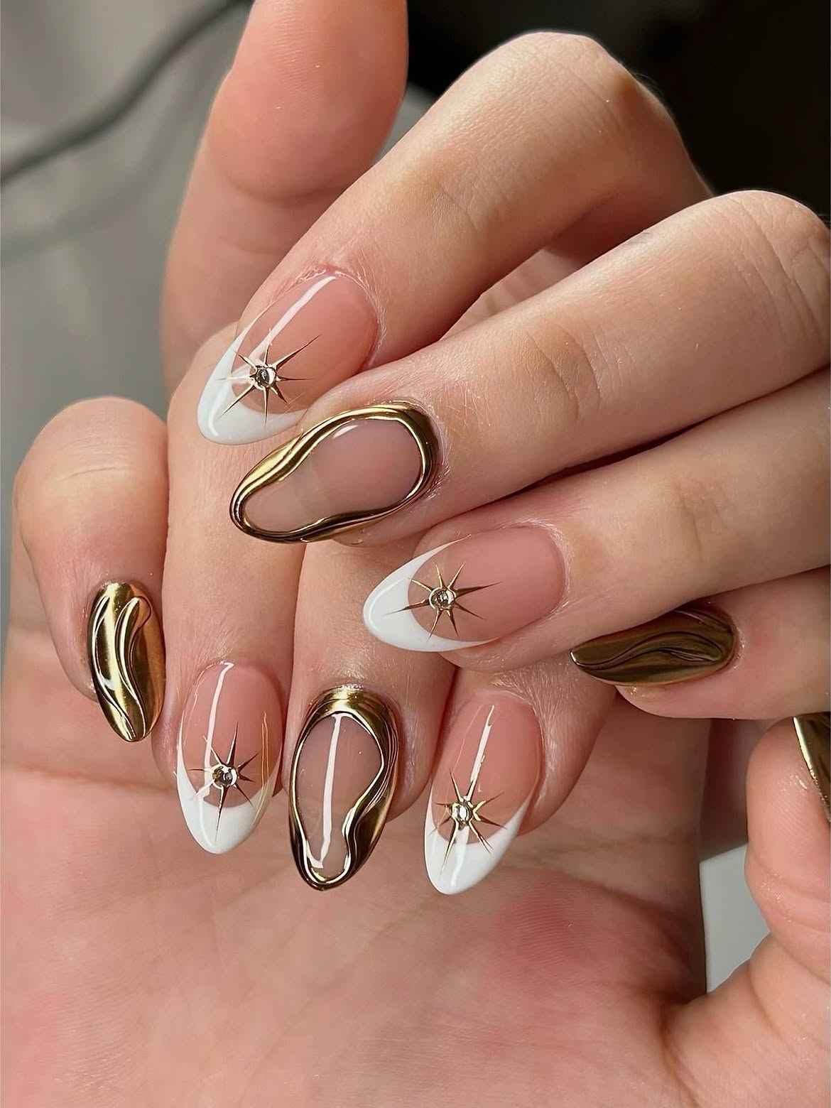Gold Chrome French Starburst Almond Nails