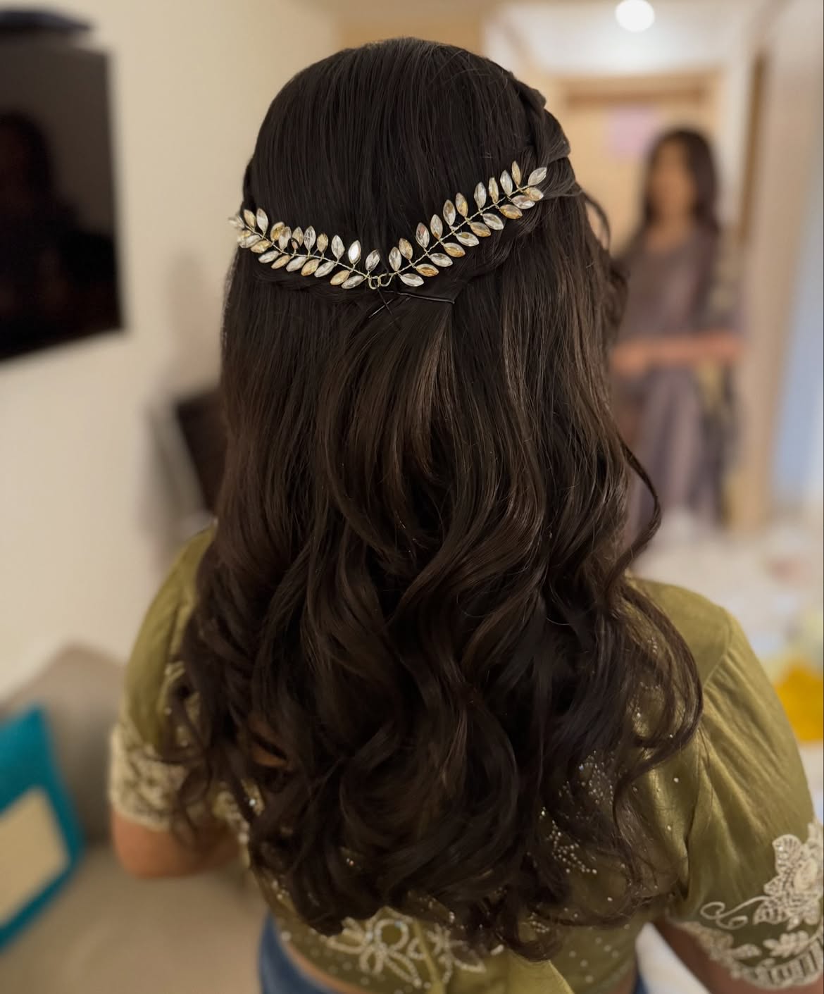 Half Up Bridal Hairstyle With Crystal Leaf Accessory