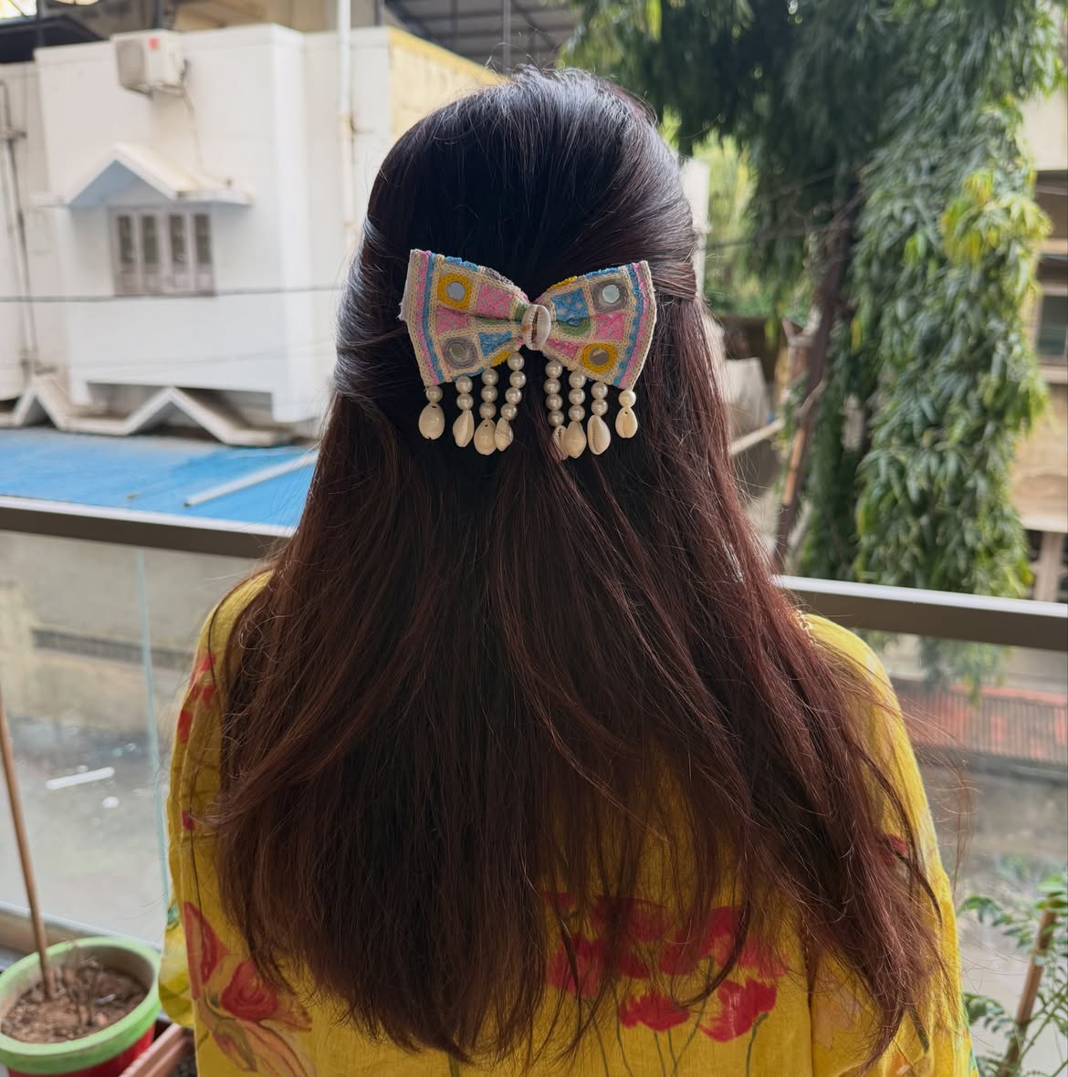 Half Up Hairstyle With Decorative Embroidered Bow Clip