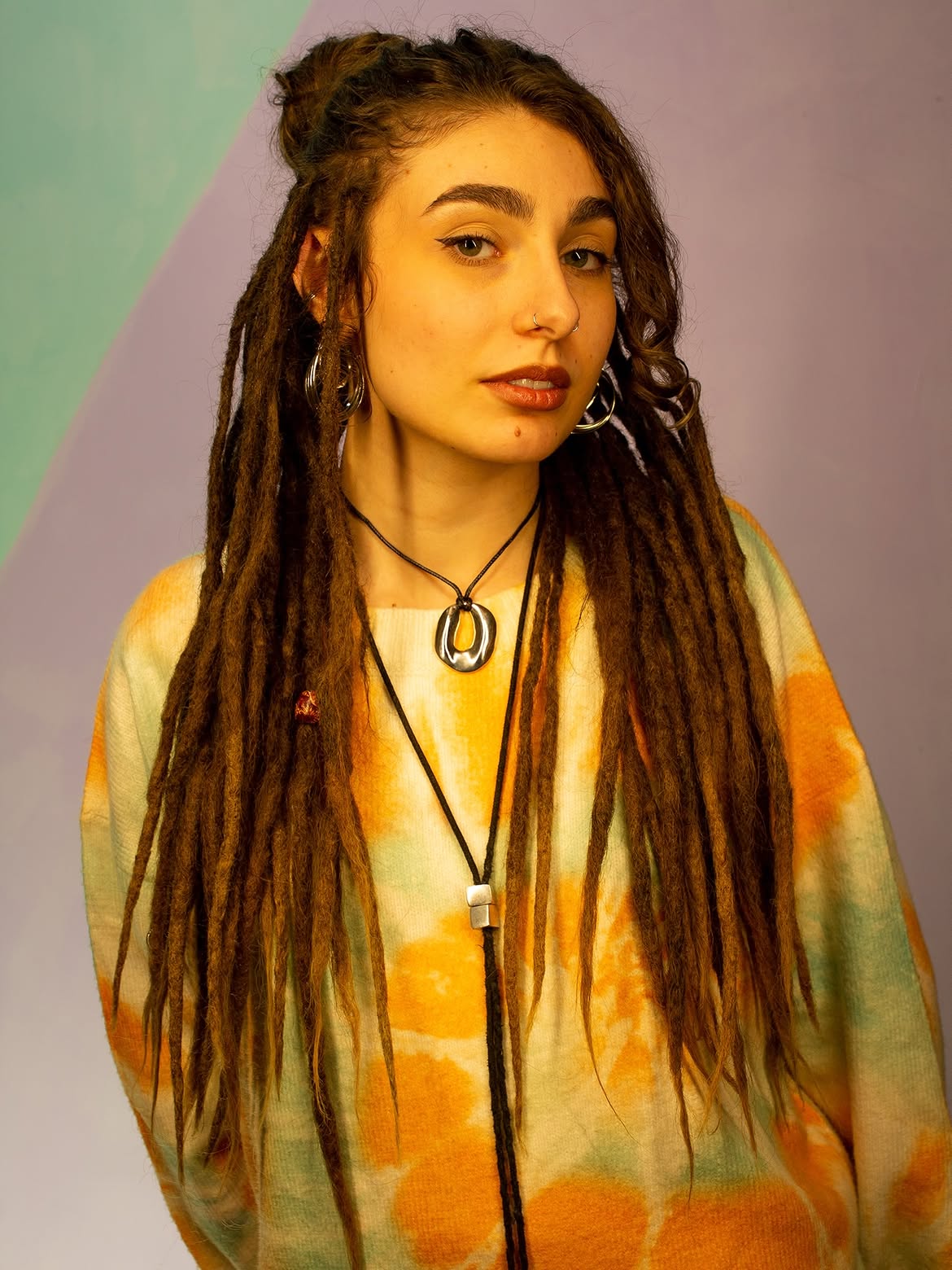 Half-Up Top Knot Dreads With Loose Curls