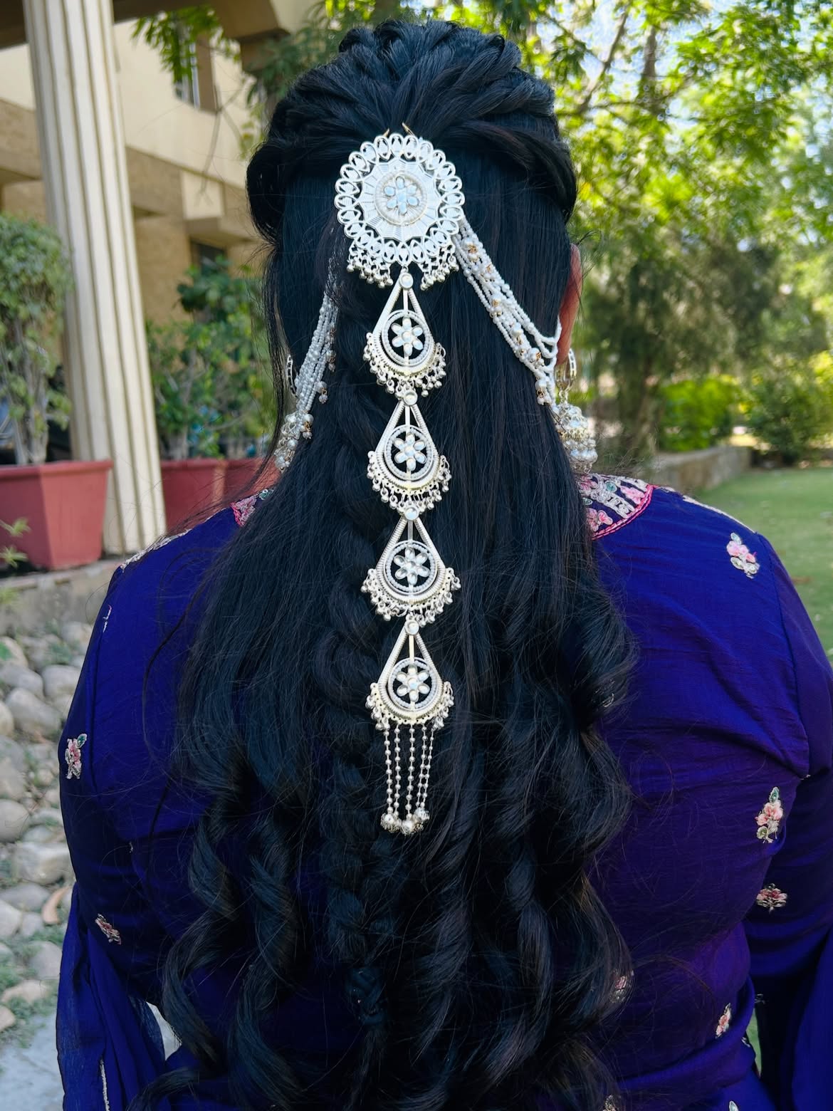 Intricate Braided Half Updo With Traditional Hair Jewelry