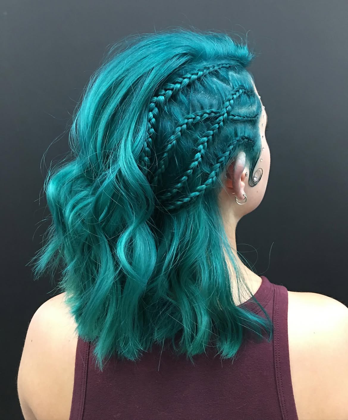 Intricate Braids With Teal Wavy Lob
