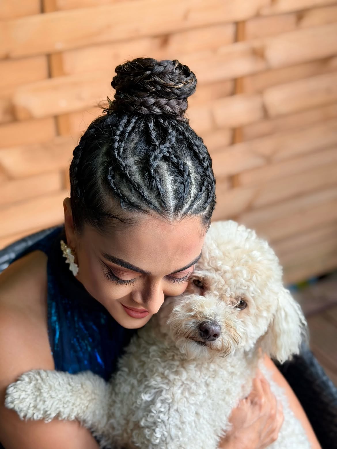 Intricate Cornrow Braids Into A Braided Top Knot