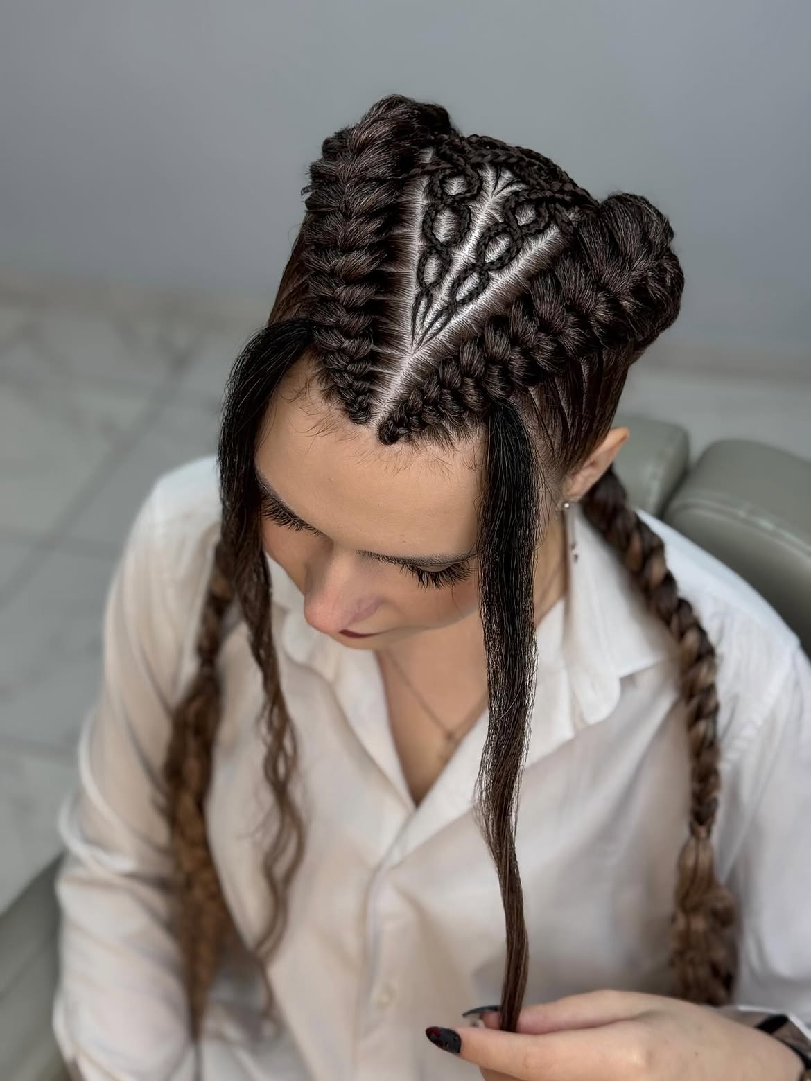 Intricate Heart Parting Cornrows With Space Buns