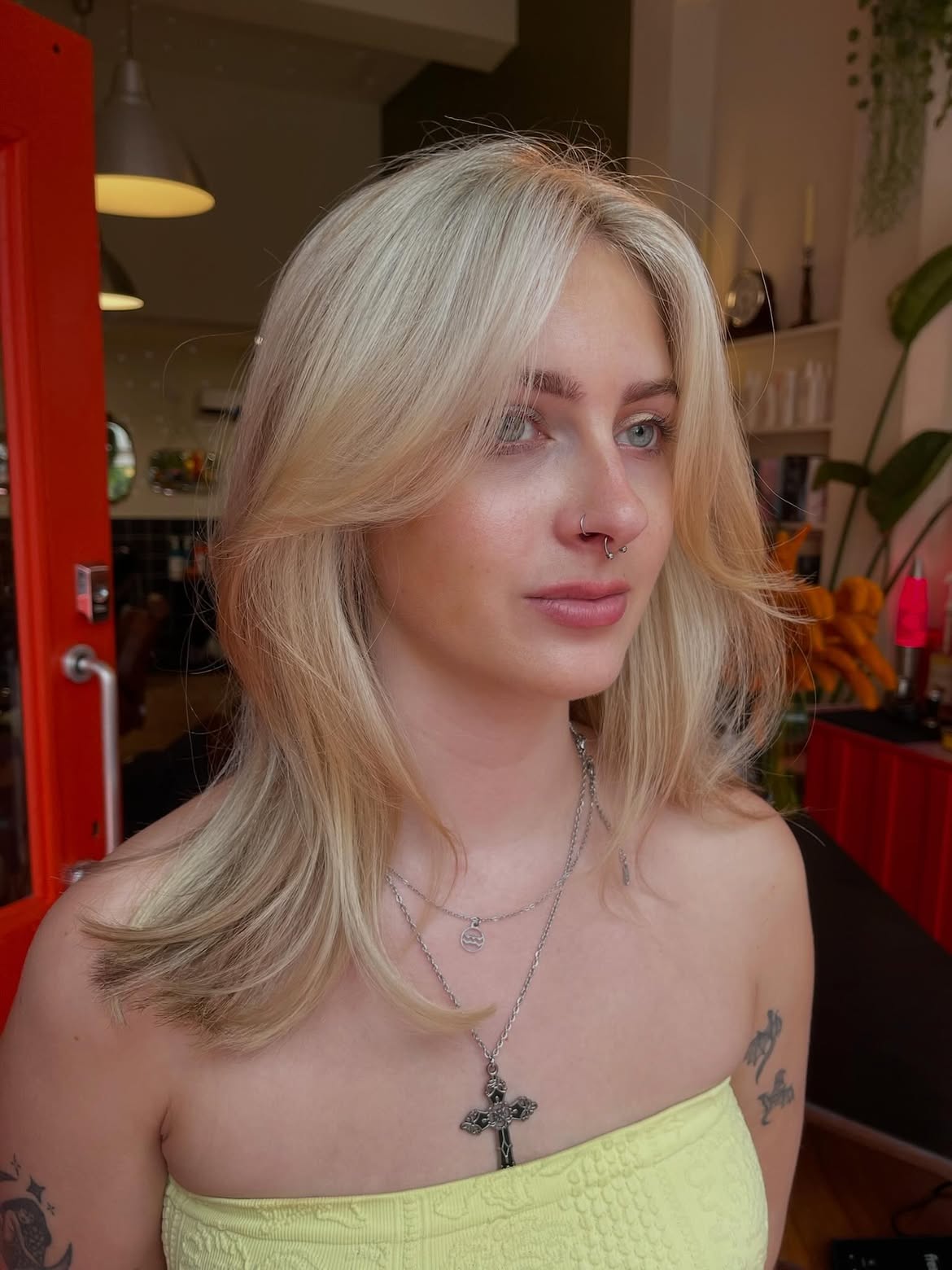 Layered Blonde Lob With Face-Framing Bangs