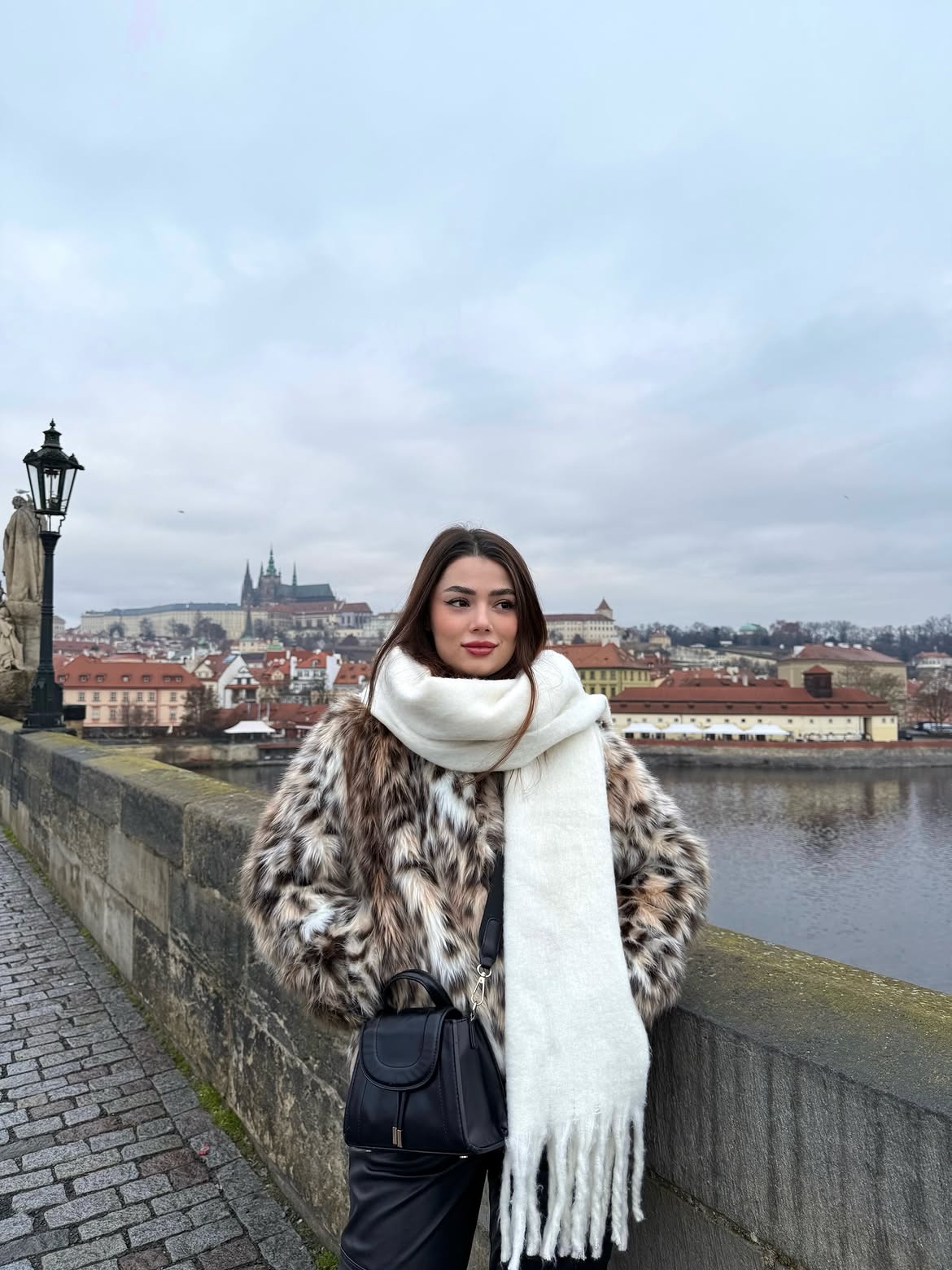Leopard Faux Fur Coat With Cream Scarf and Black Leather Pants