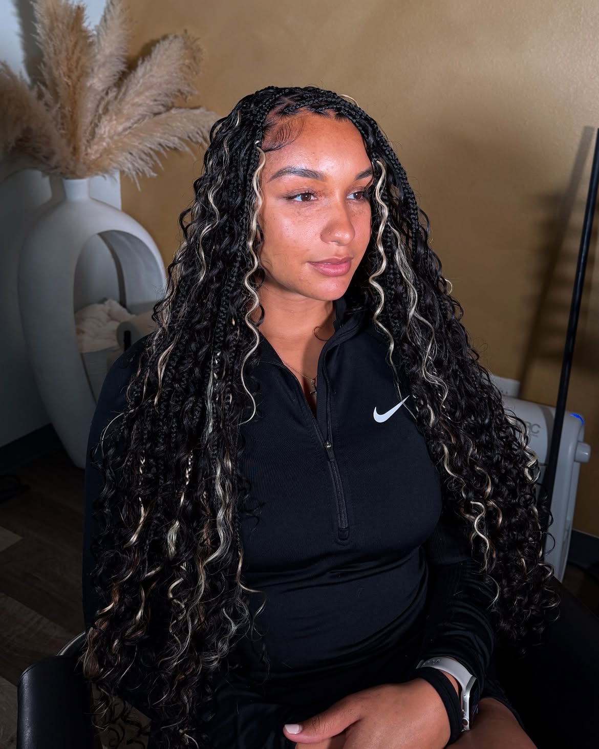Long Boho Braids With Curly Ends and Blonde Streaks