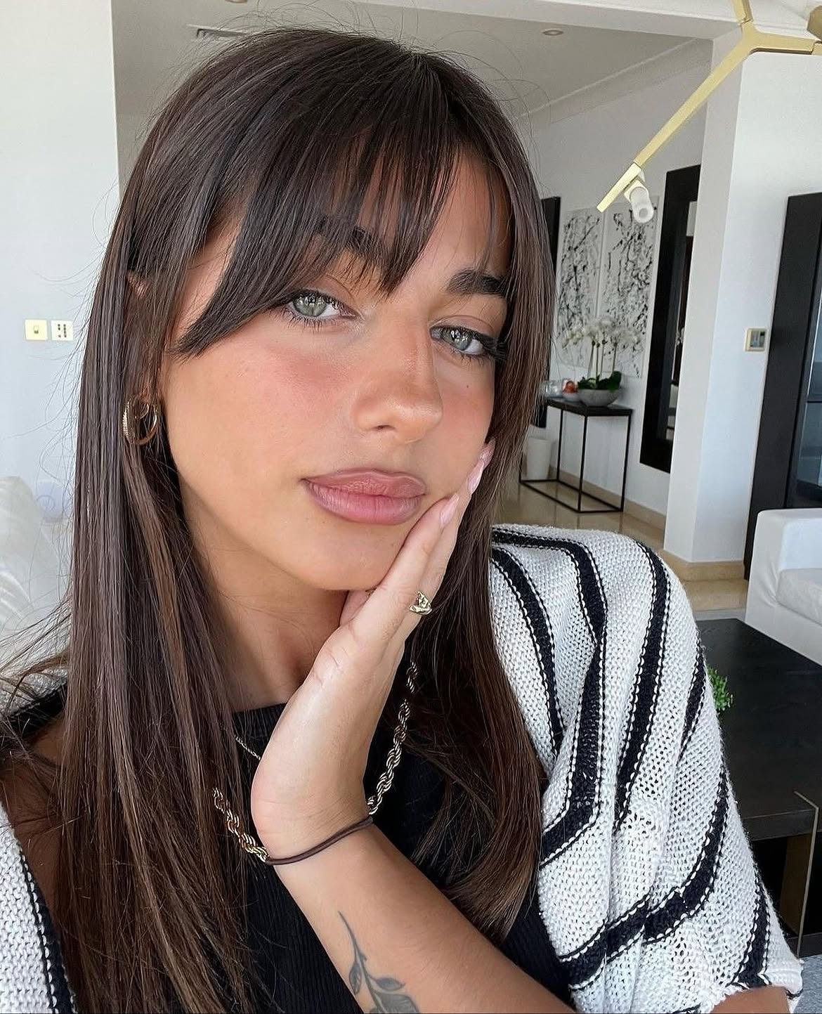 Long Brunette With Effortless Curtain Bangs
