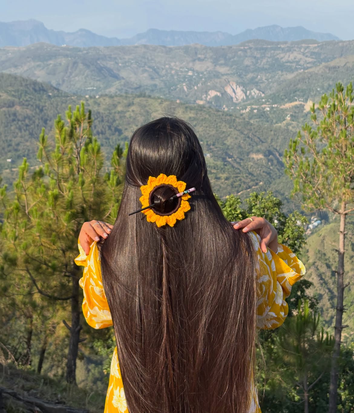 Long Sleek Hair With Crocheted Sunflower Accessory