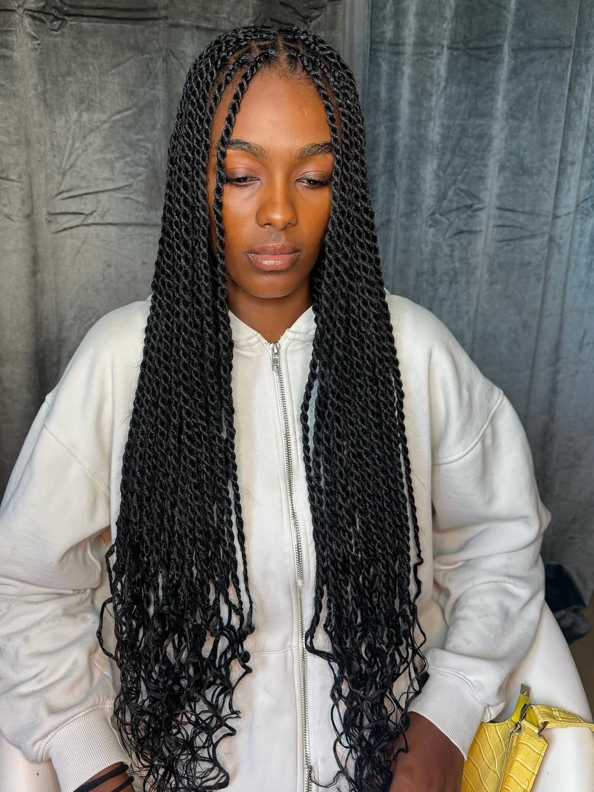 Long Twisted Braids With Curly Ends