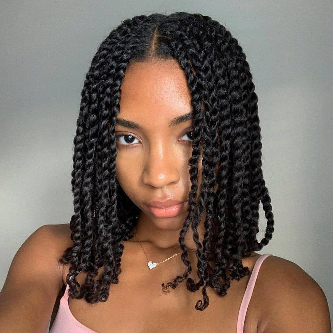 Medium Length Two-Strand Twists With Defined Curls