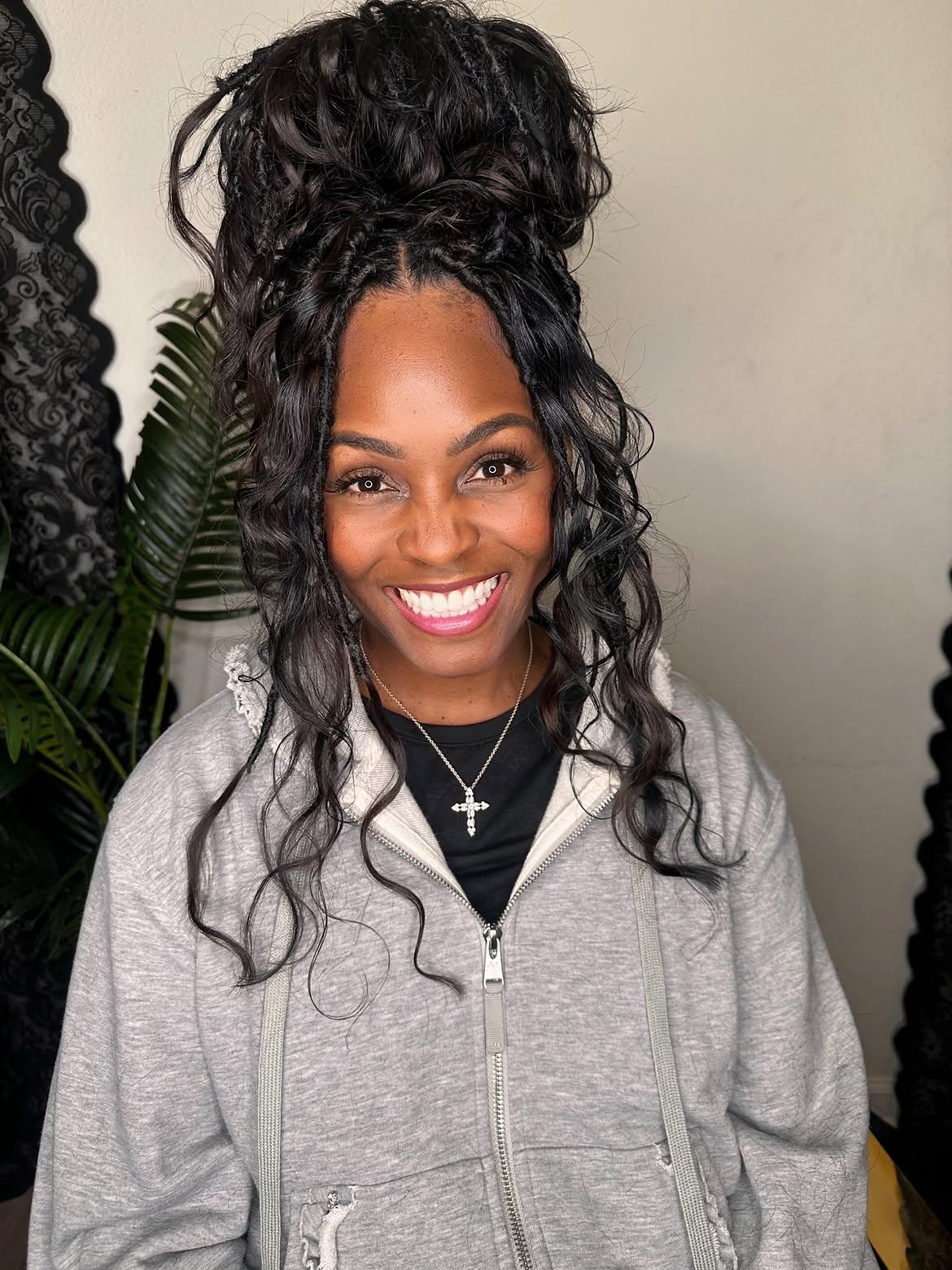 Messy Boho Braided Updo With Loose Waves