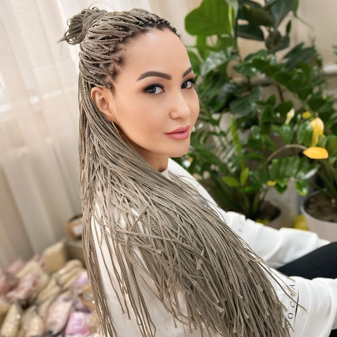 Micro Braids With Trendy Top Knot Style