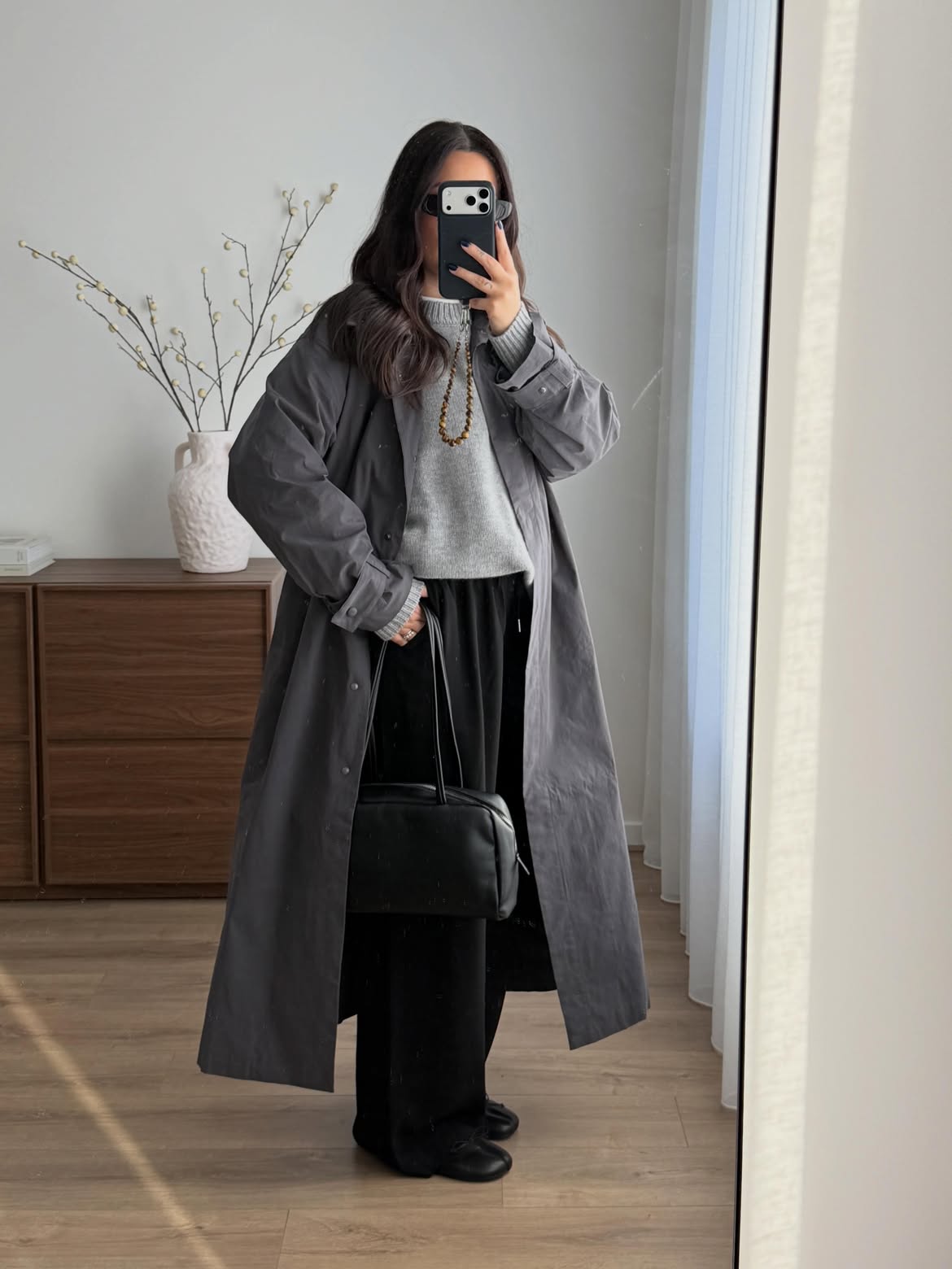 Monochrome Grey Trench Coat Over Cozy Knit Ensemble