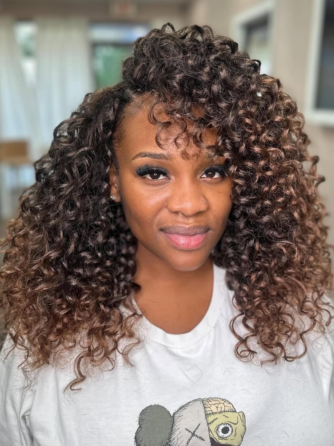 Natural Curl Crochet Braids With Honey Blonde Highlights