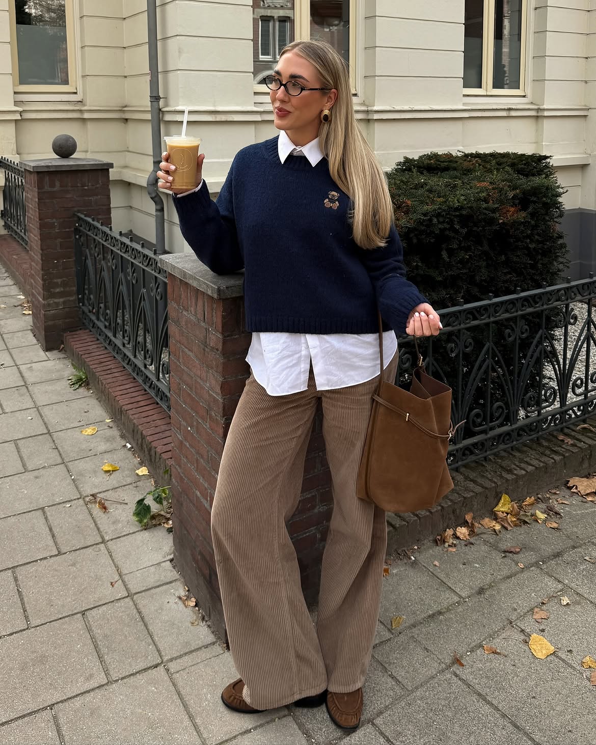 Navy Knit Sweater Over Crisp White Shirt And Corduroy Pants