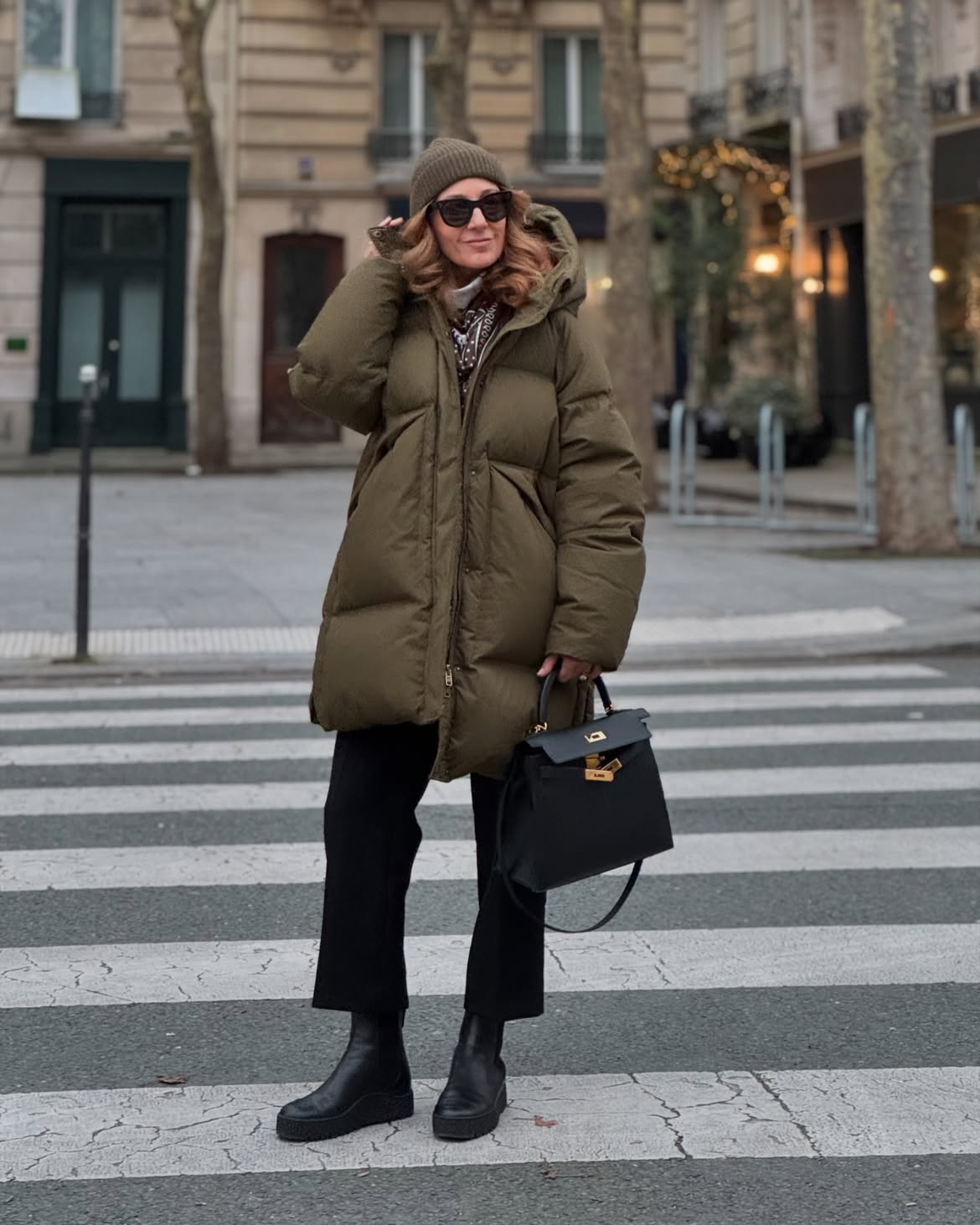 Olive Puffer Coat With Black Pants And Boots
