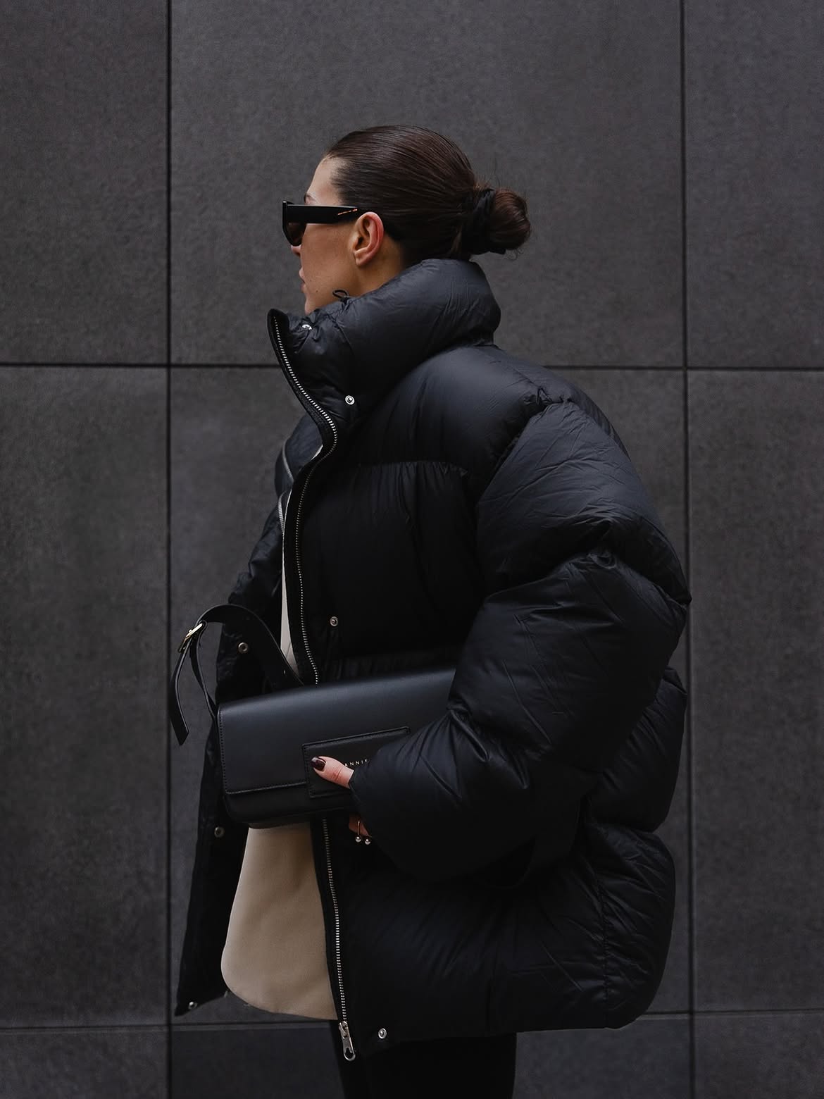 Oversized Black Puffer Jacket And Structured Leather Bag