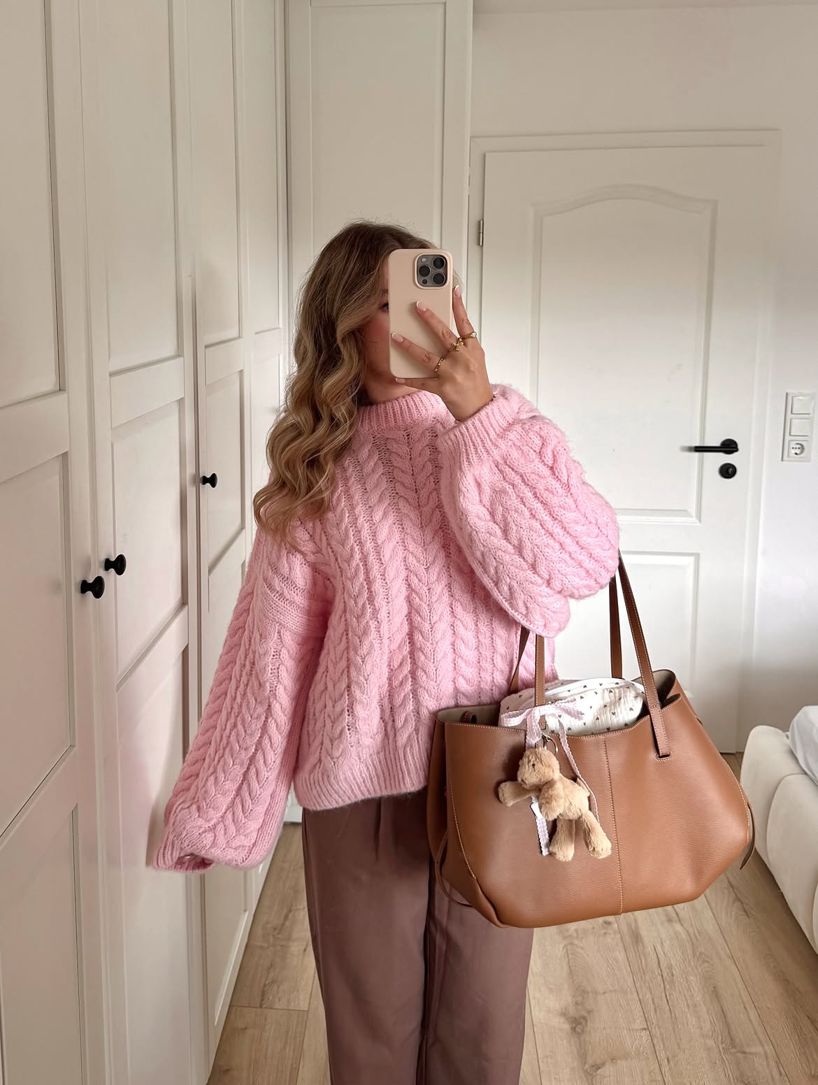 Pink Cable Knit Sweater With Brown Trousers