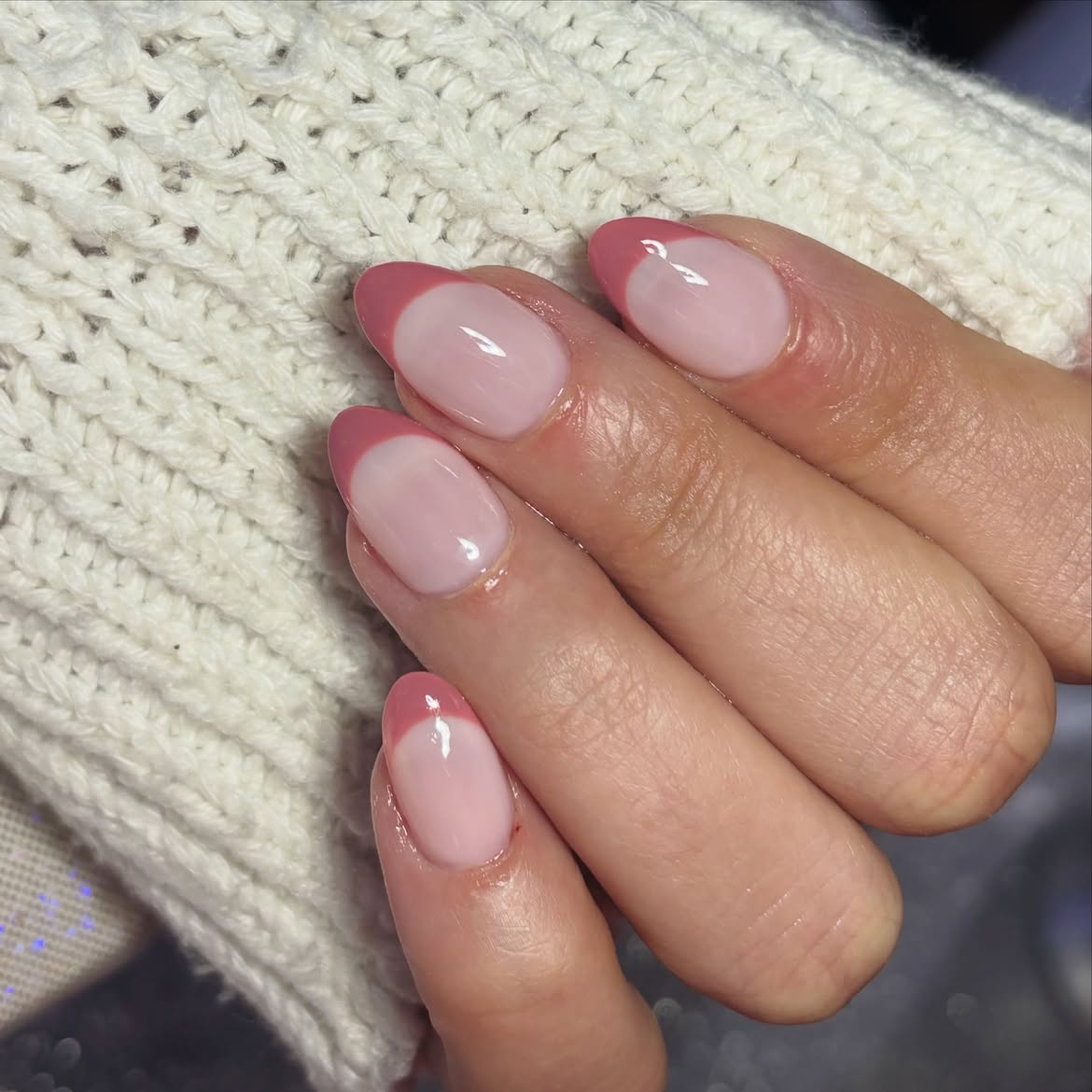 Pink French Tips on Milky Base Almond Nails
