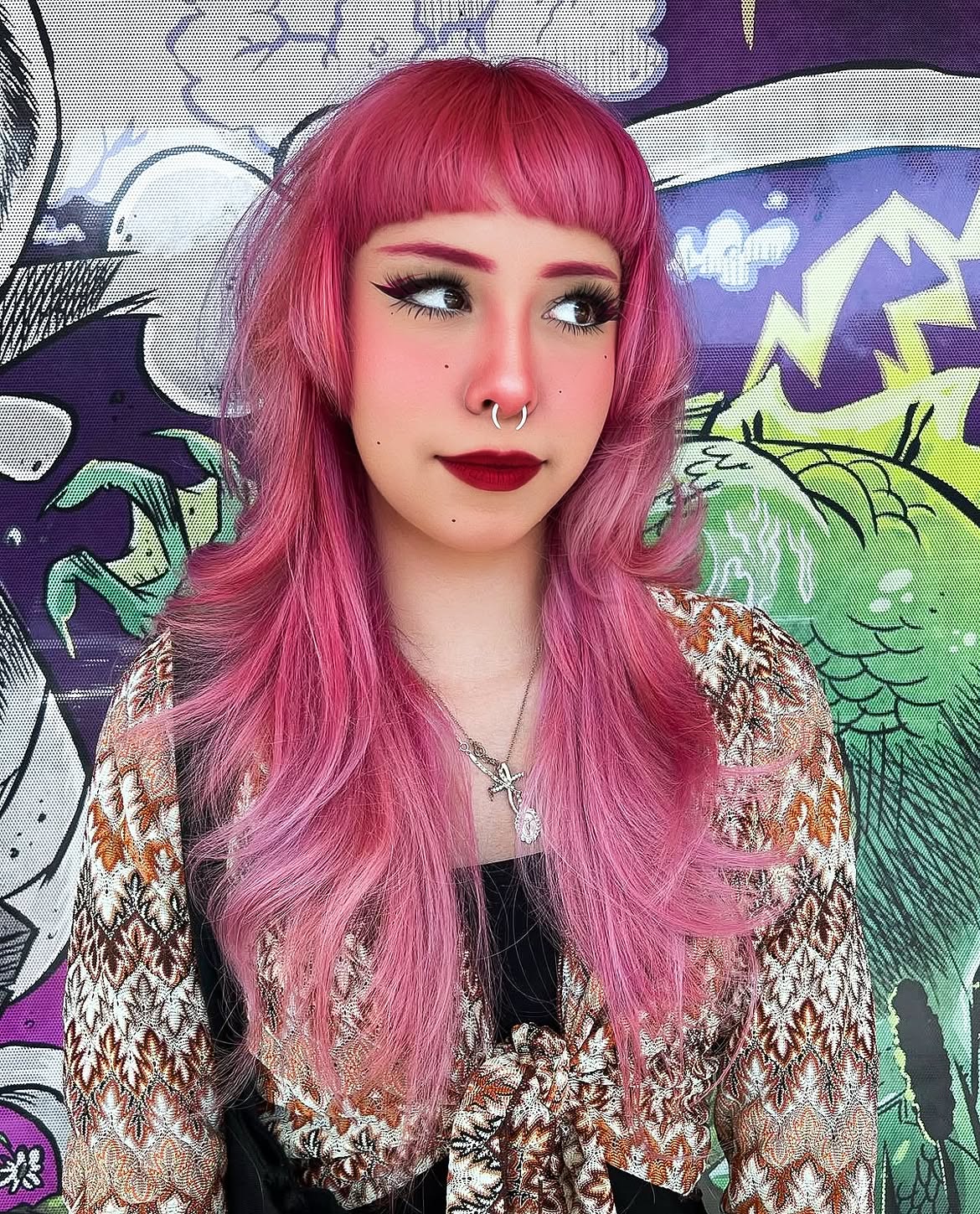 Pink Shag With Choppy Bangs and Faded Ends