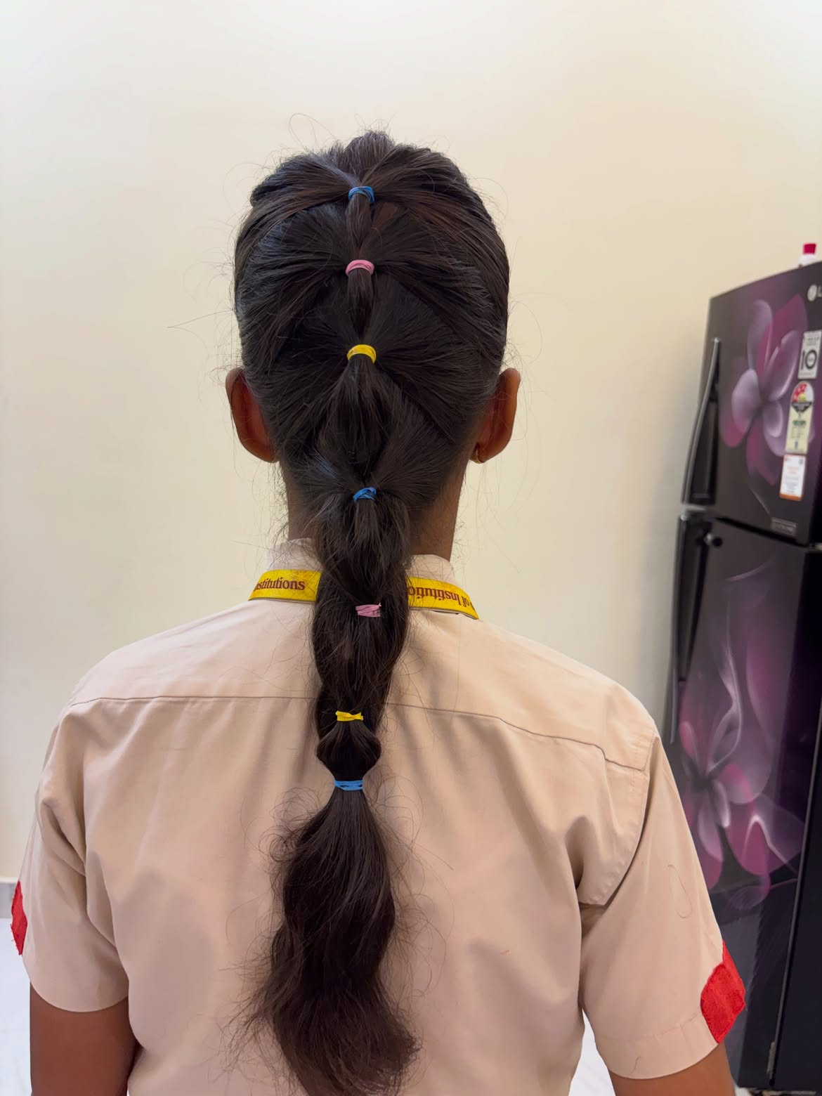 Playful Bubble Braided Ponytail With Colorful Elastics