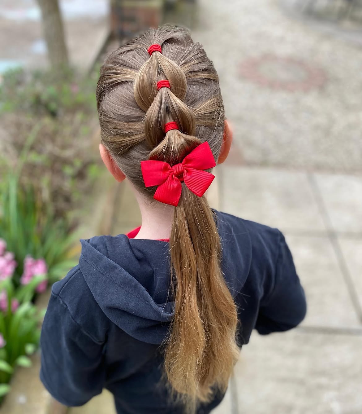 Polished Pull Through Braid With Red Ribbon Bow