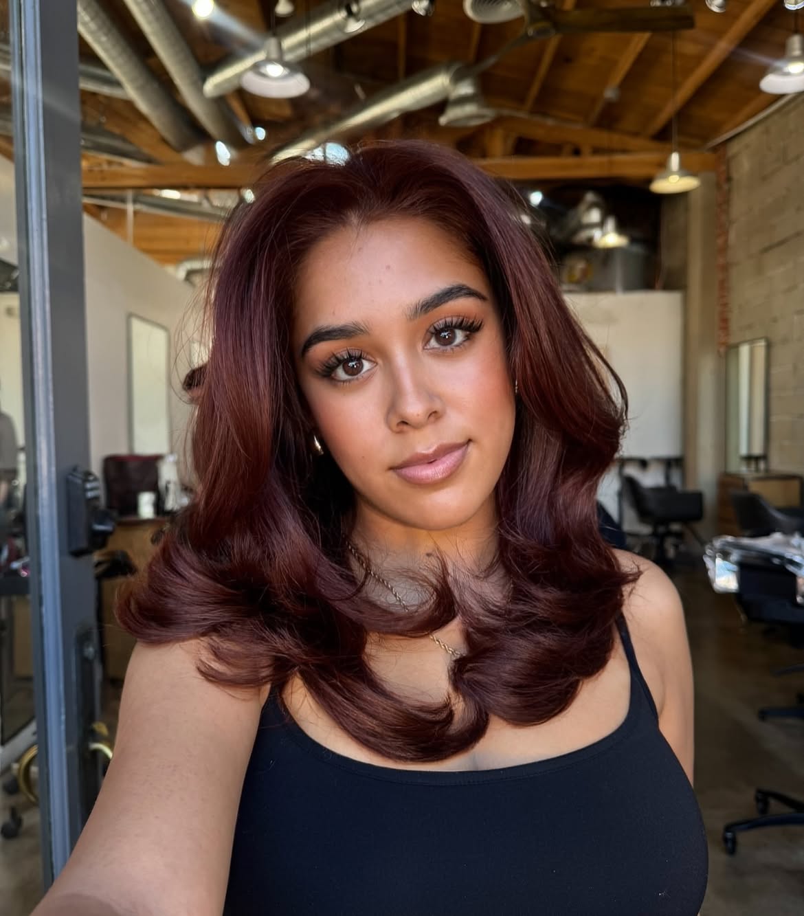 Rich Auburn Balayage With Voluminous Hollywood Waves
