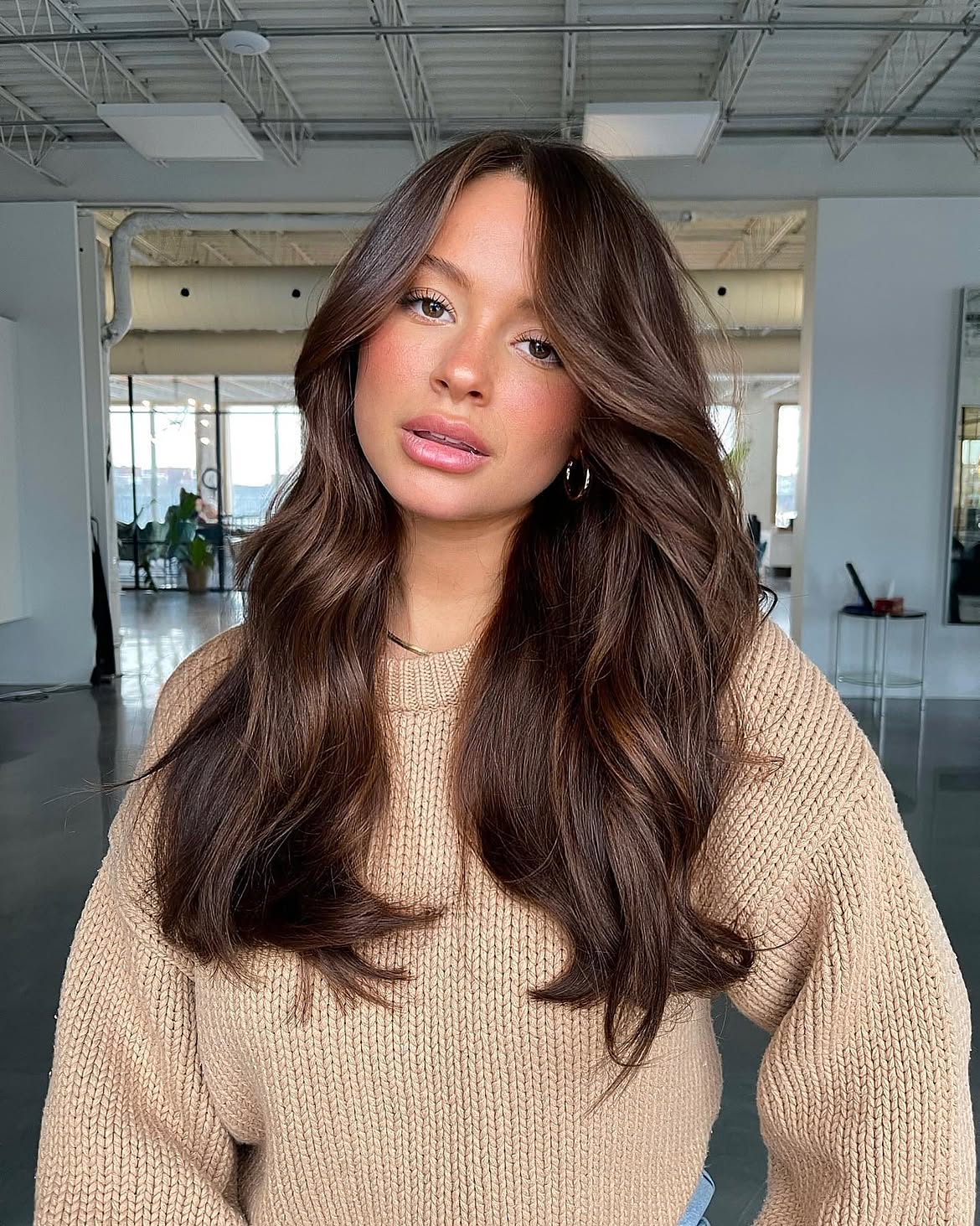Rich Chestnut Layers With Voluminous Curtain Bangs