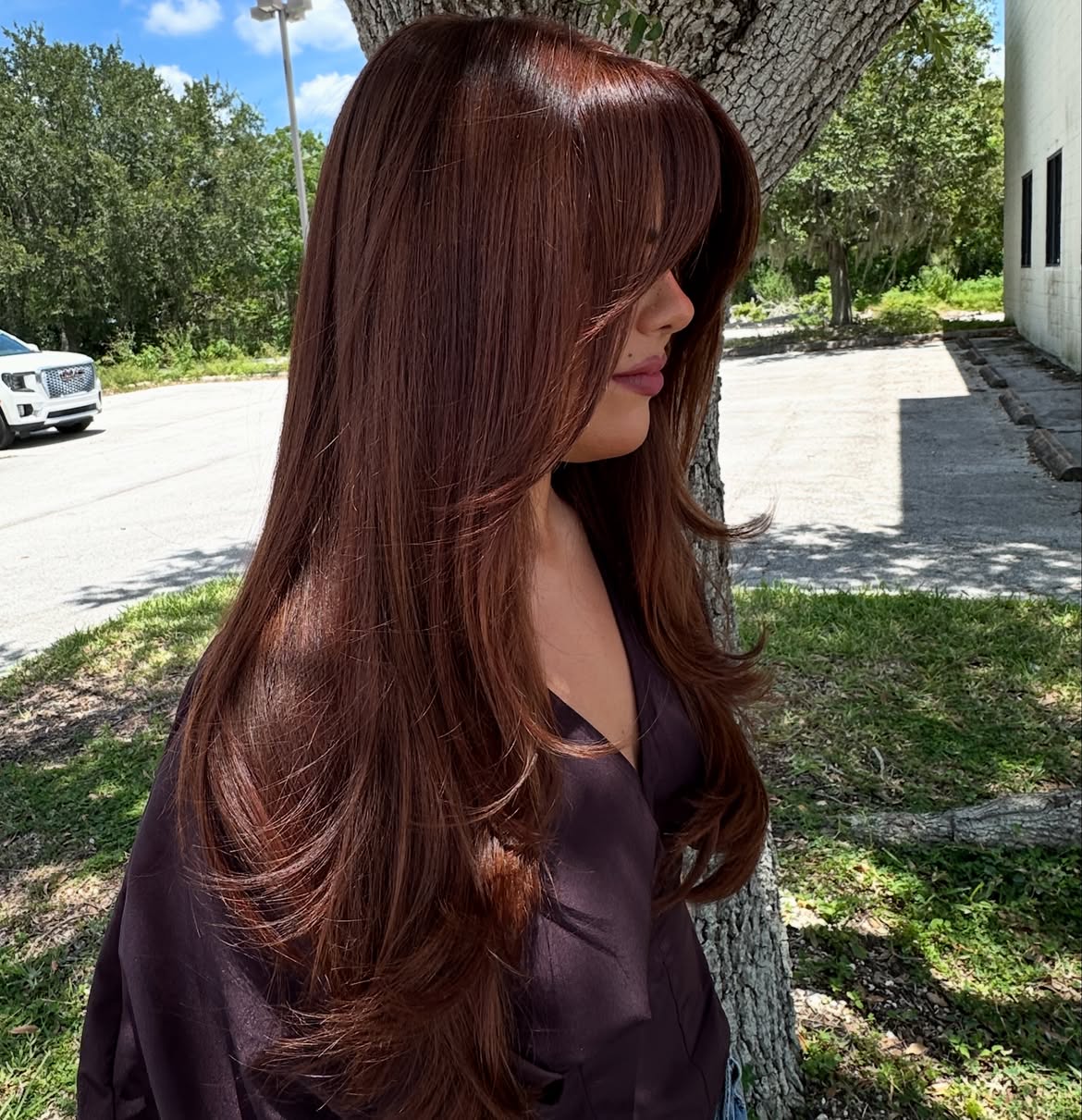Rich Copper Brown Layers With Soft Curtain Bangs