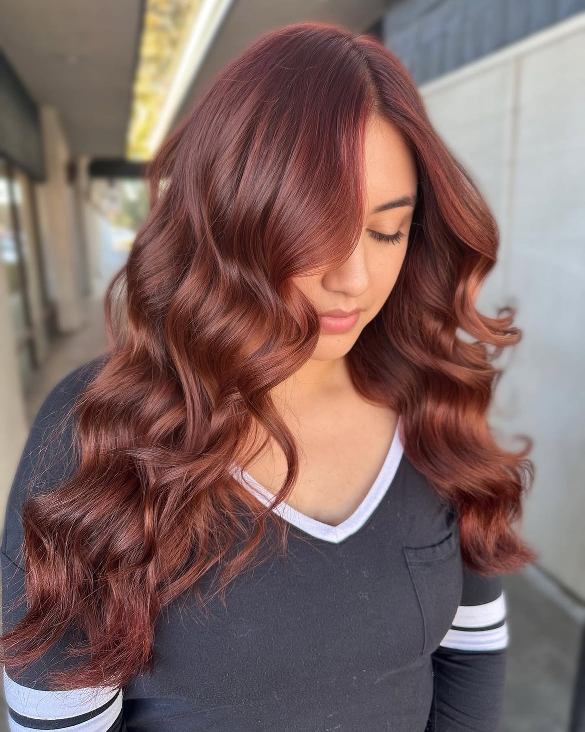 Rich Copper Brown Waves With Face Framing Layers