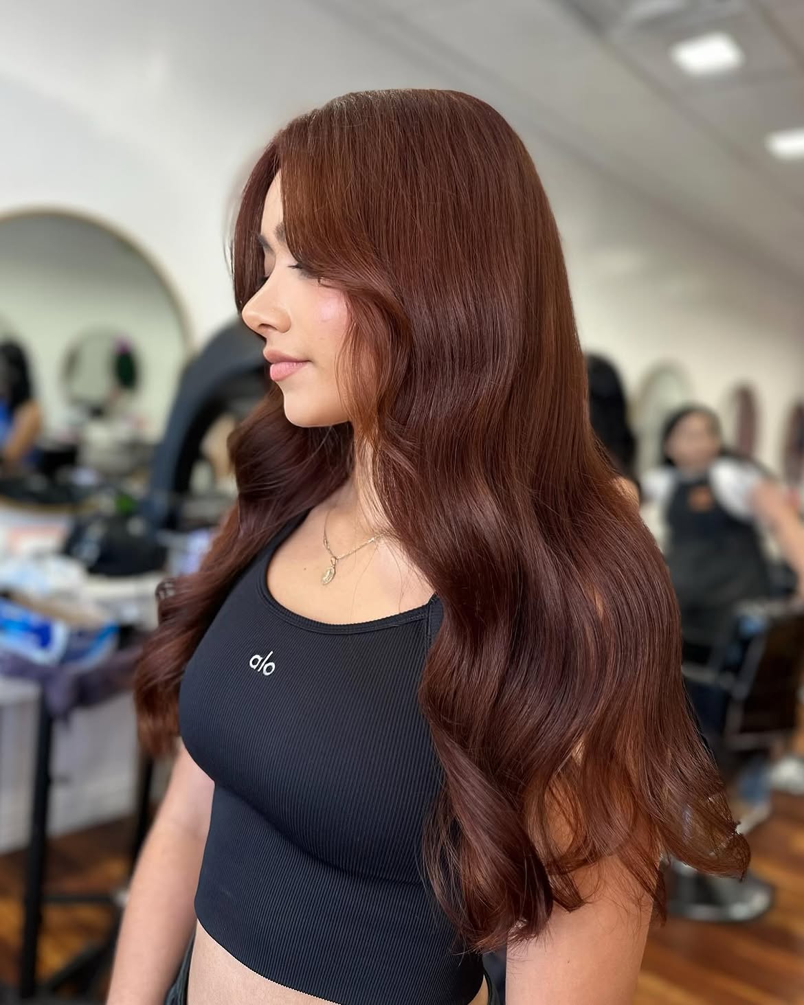Rich Copper Brown Waves With Face Framing Layers