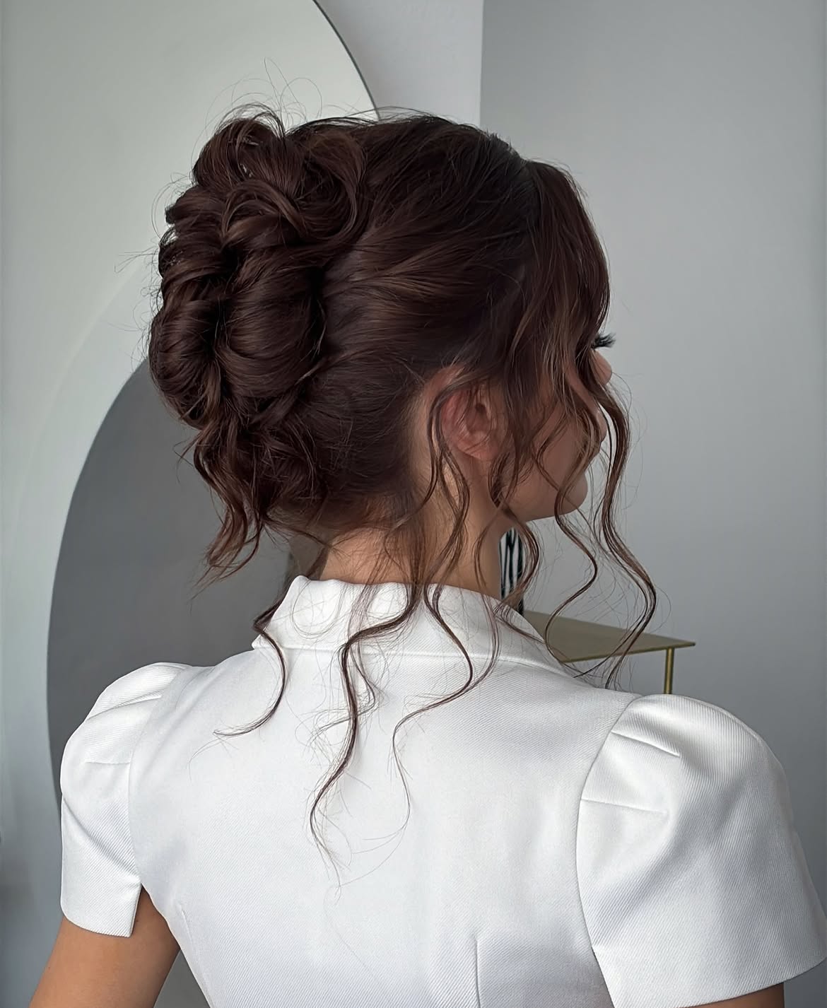 Romantic Braided Updo With Loose Curls
