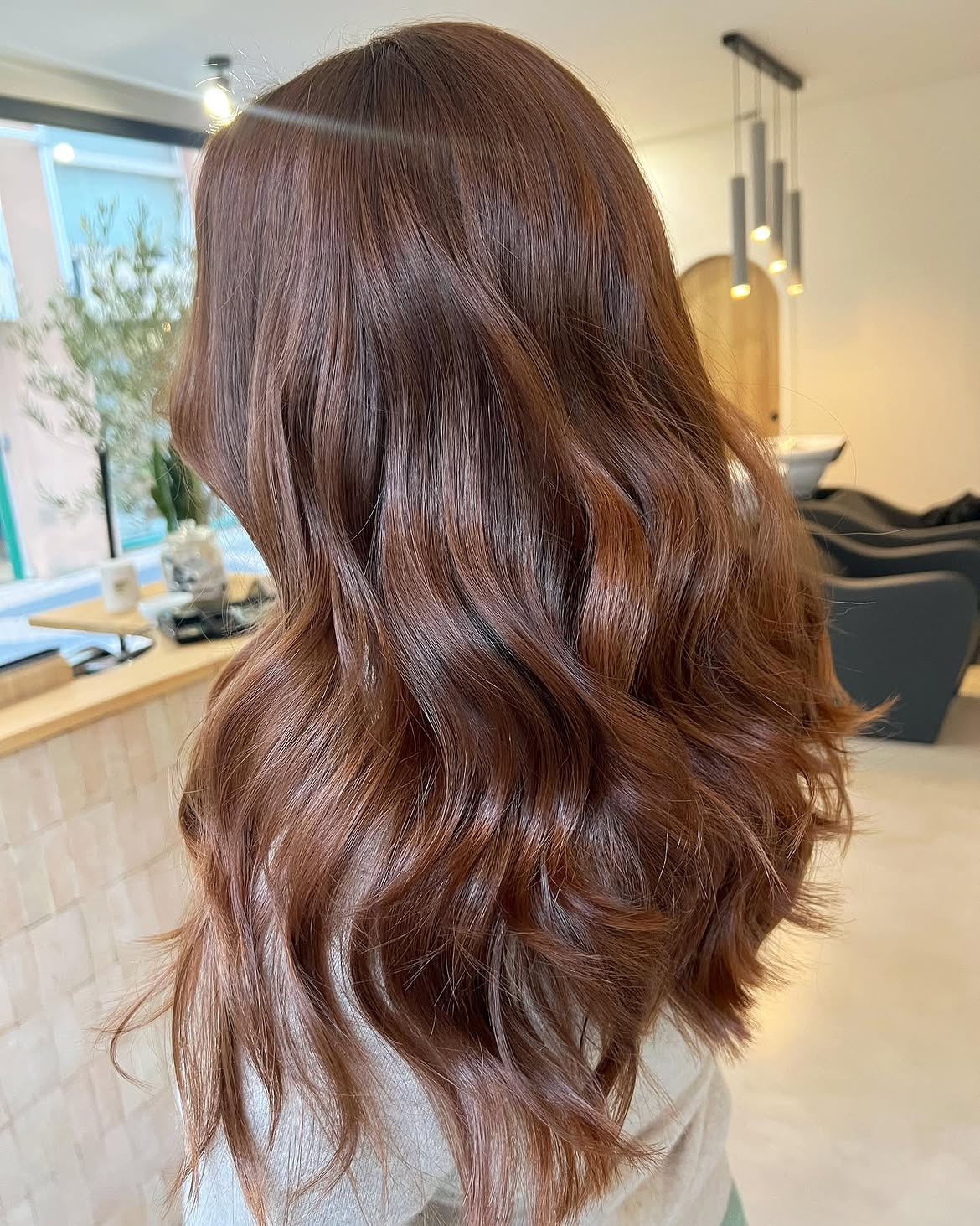 Rose Gold Brunette Waves With Subtle Layers