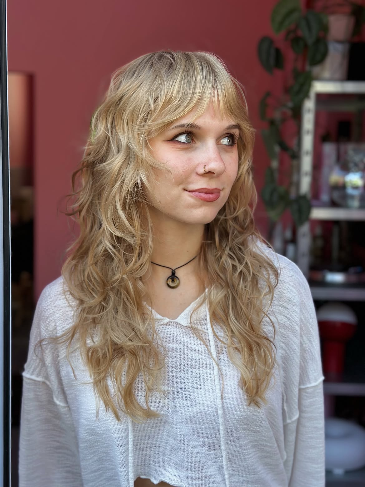 Shag Cut With Wispy Bangs And Honey Blonde Waves