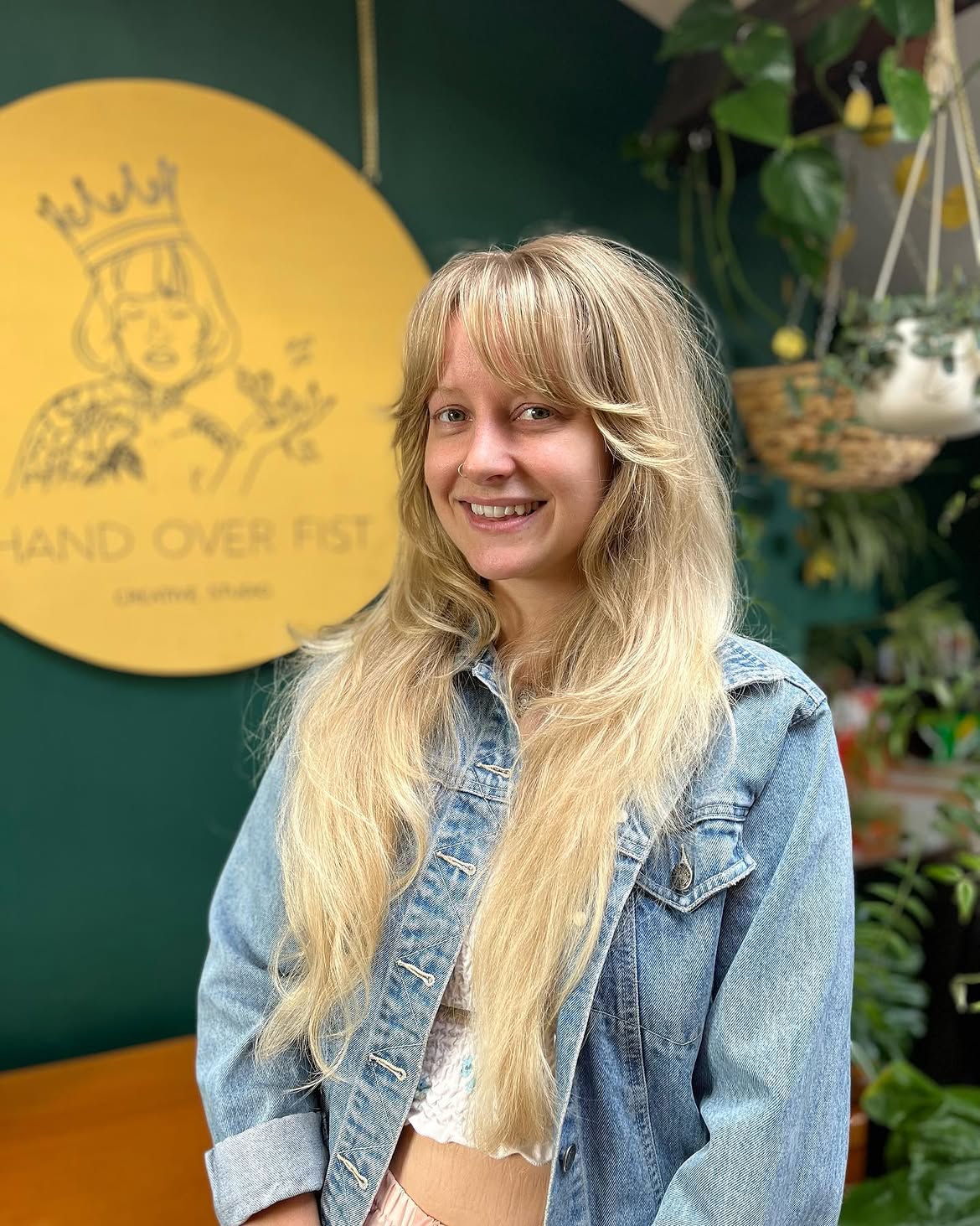 Shaggy Blonde Waves With Face-Framing Curtain Bangs