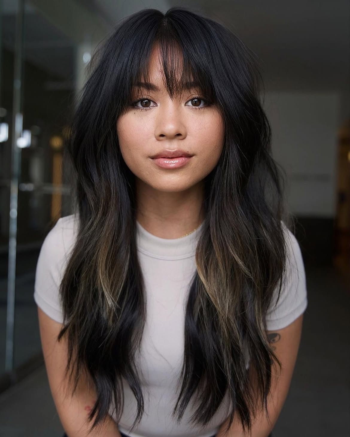 Shaggy Dark Hair With Subtle Caramel Highlights