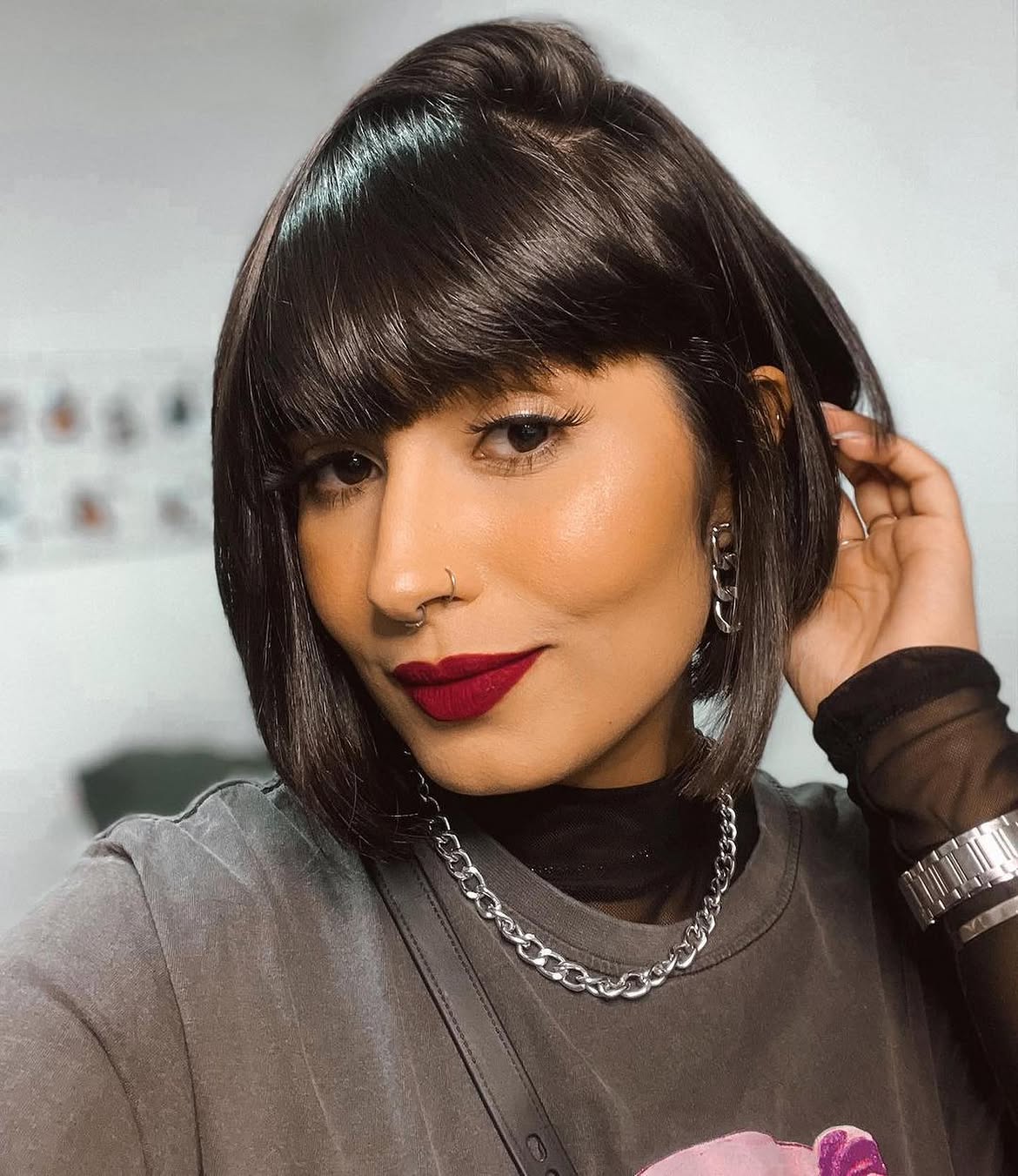 Sharp Blunt Bob With Full Dark Bangs