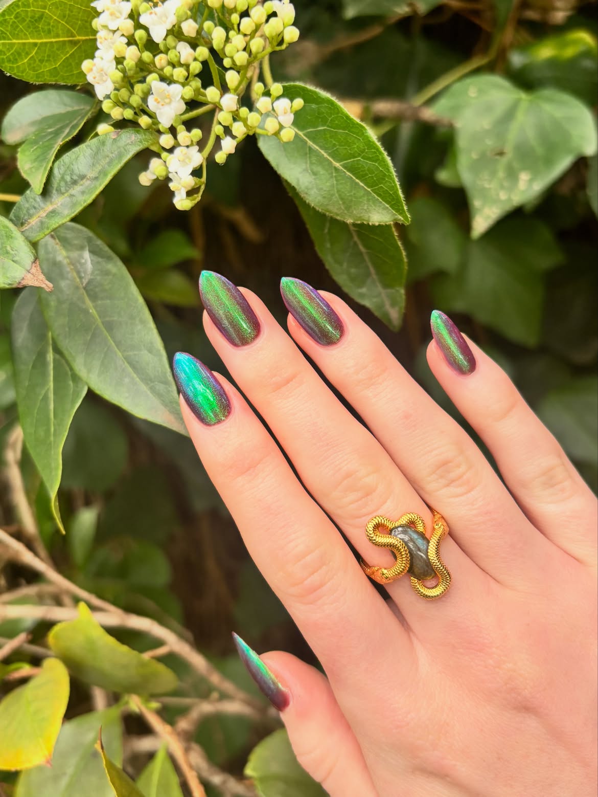 Shimmering Emerald Green Stiletto Mooncat Nails