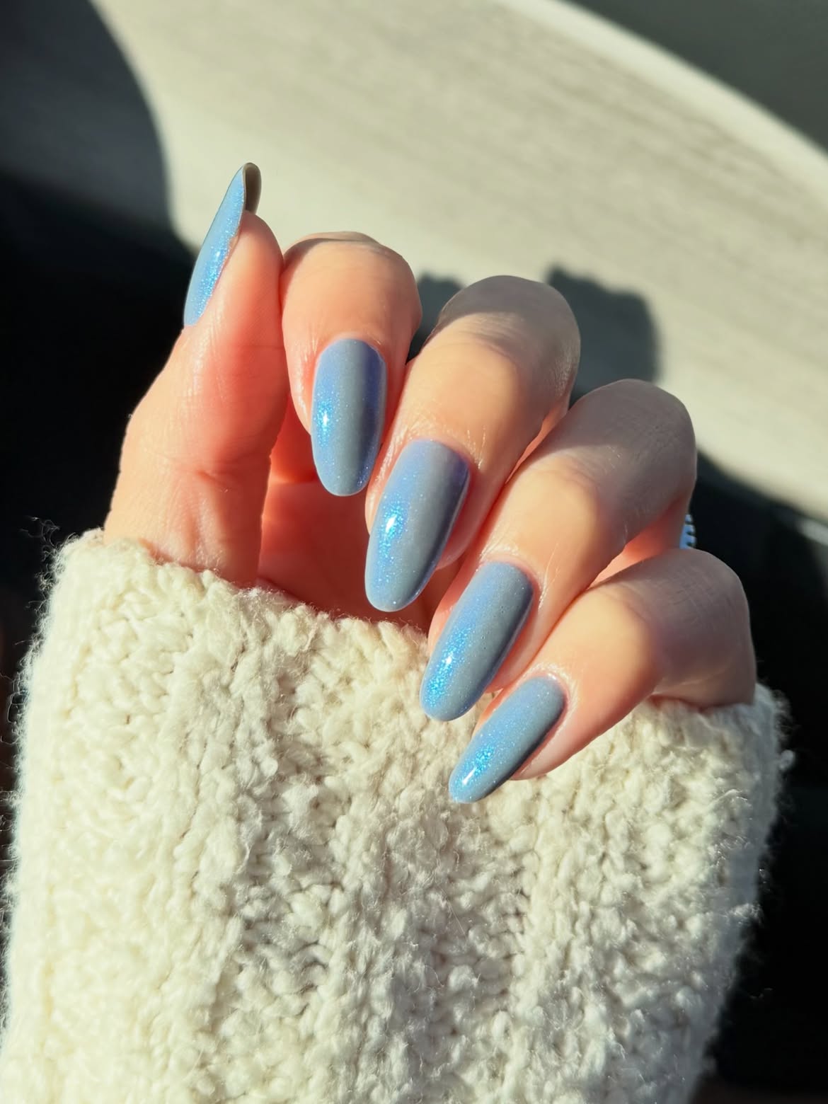 Shimmering Periwinkle Blue Almond Nails