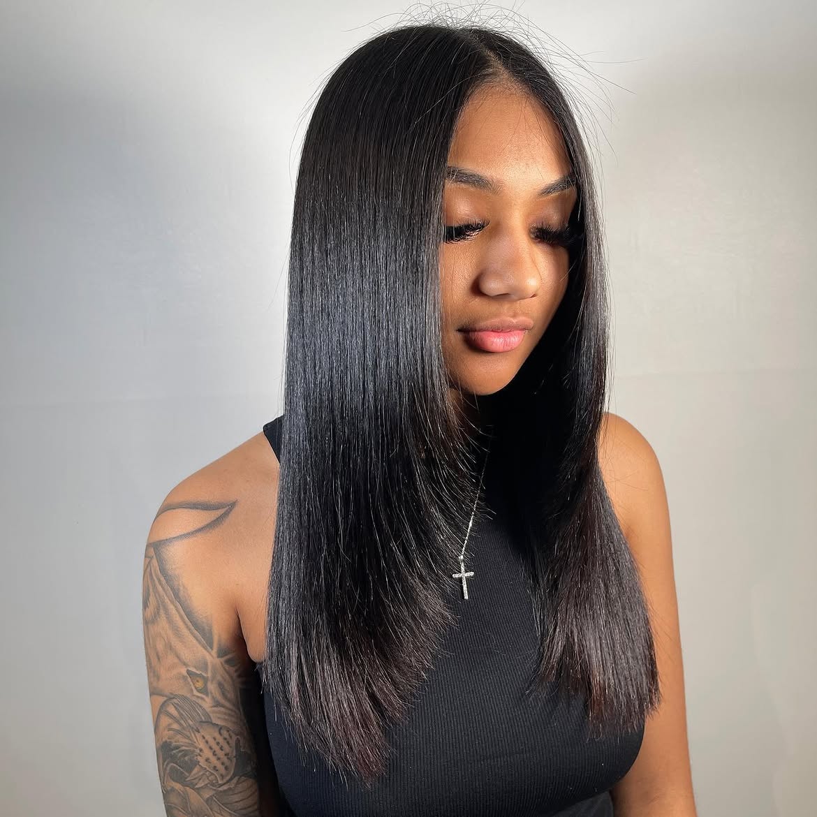 Sleek and Shiny Long Layers with Subtle Face Framing