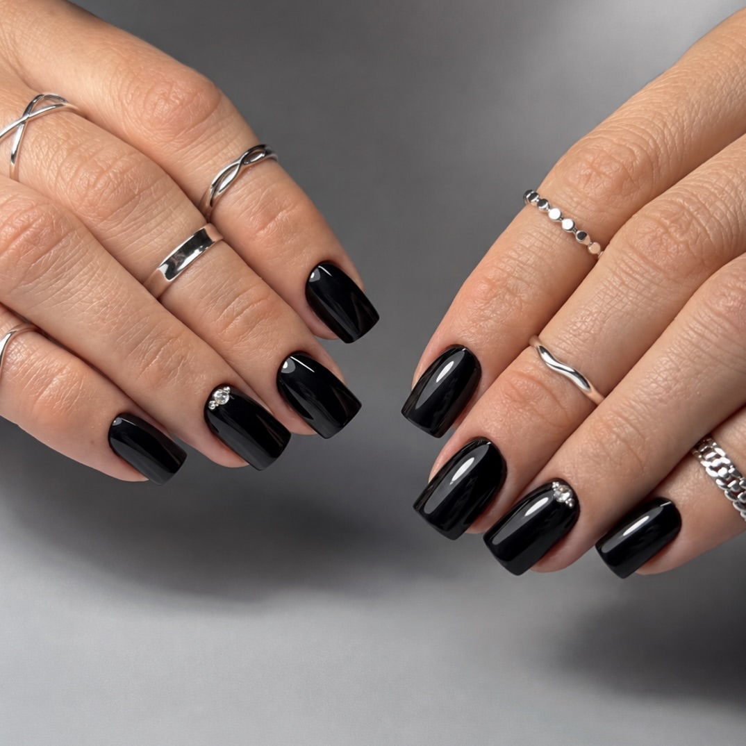 Sleek Black Square Nails With Subtle Sparkle
