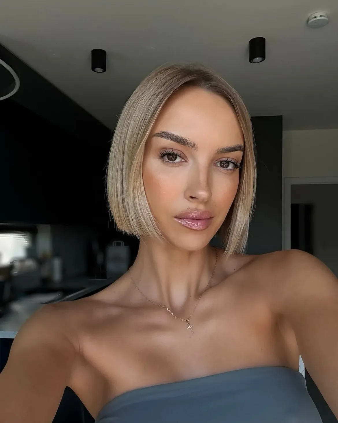 Sleek Blunt Bob With Face Framing Layers