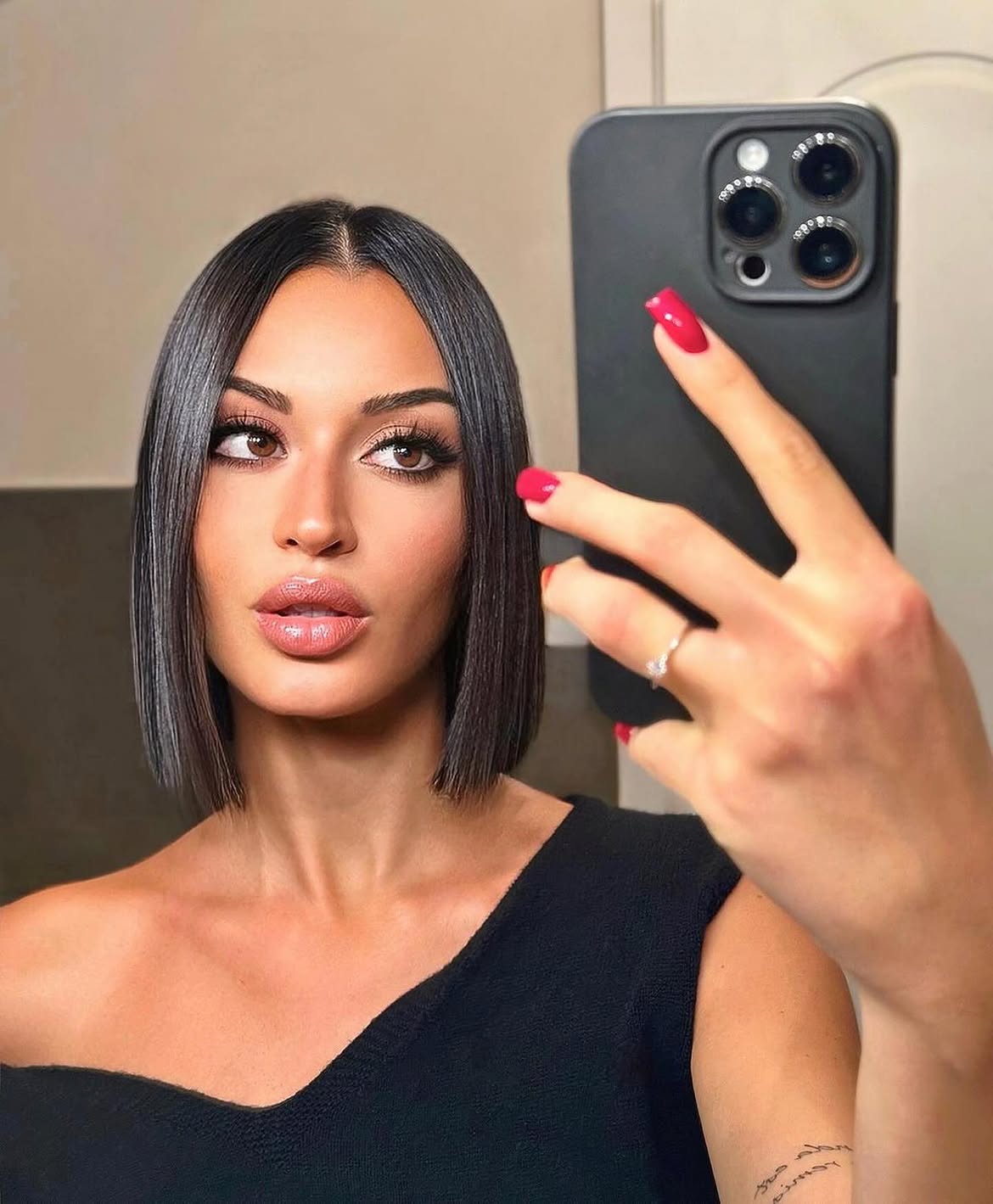 Sleek Blunt Bob With Sharp Center Part