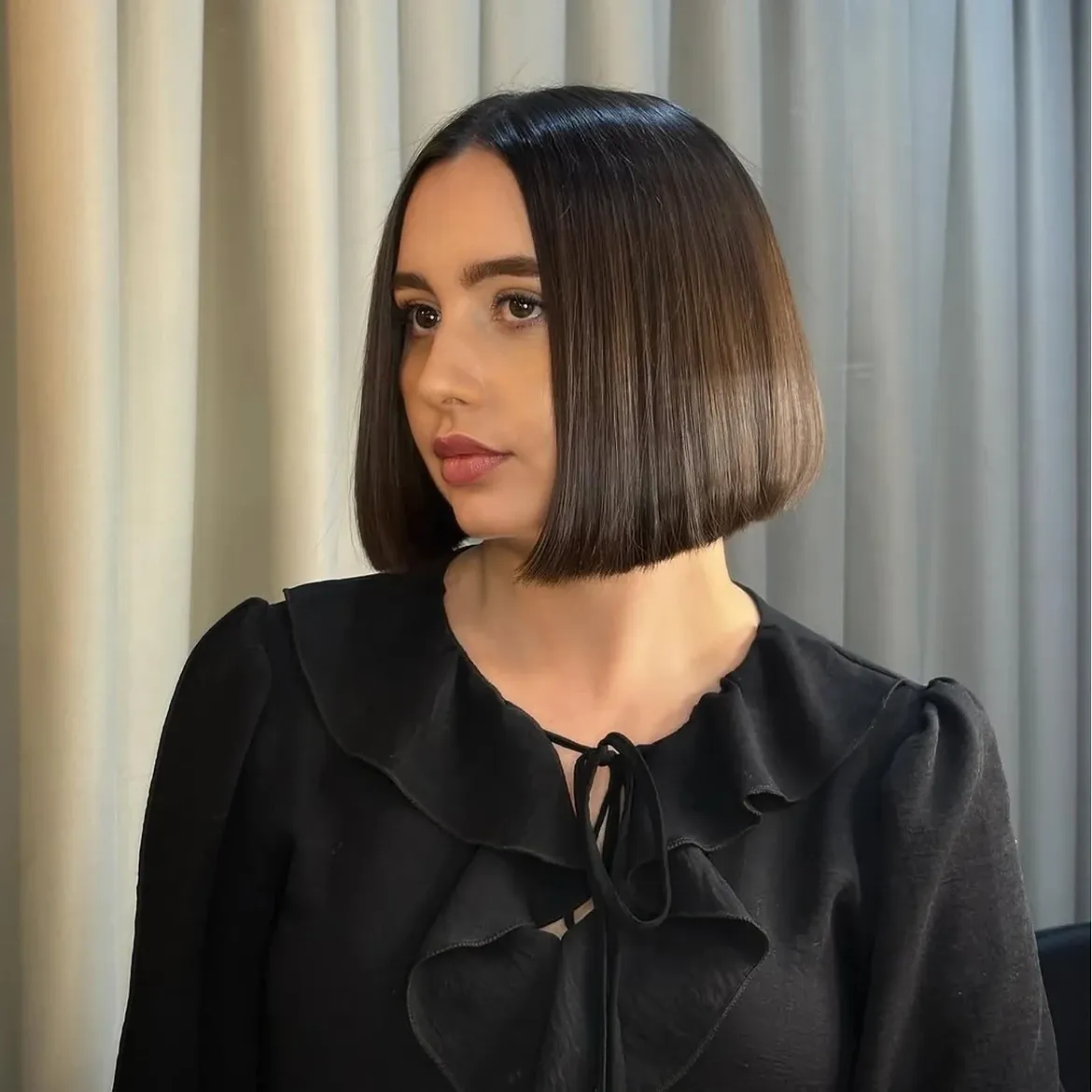 Sleek Blunt Bob With Subtle Deep Side Part