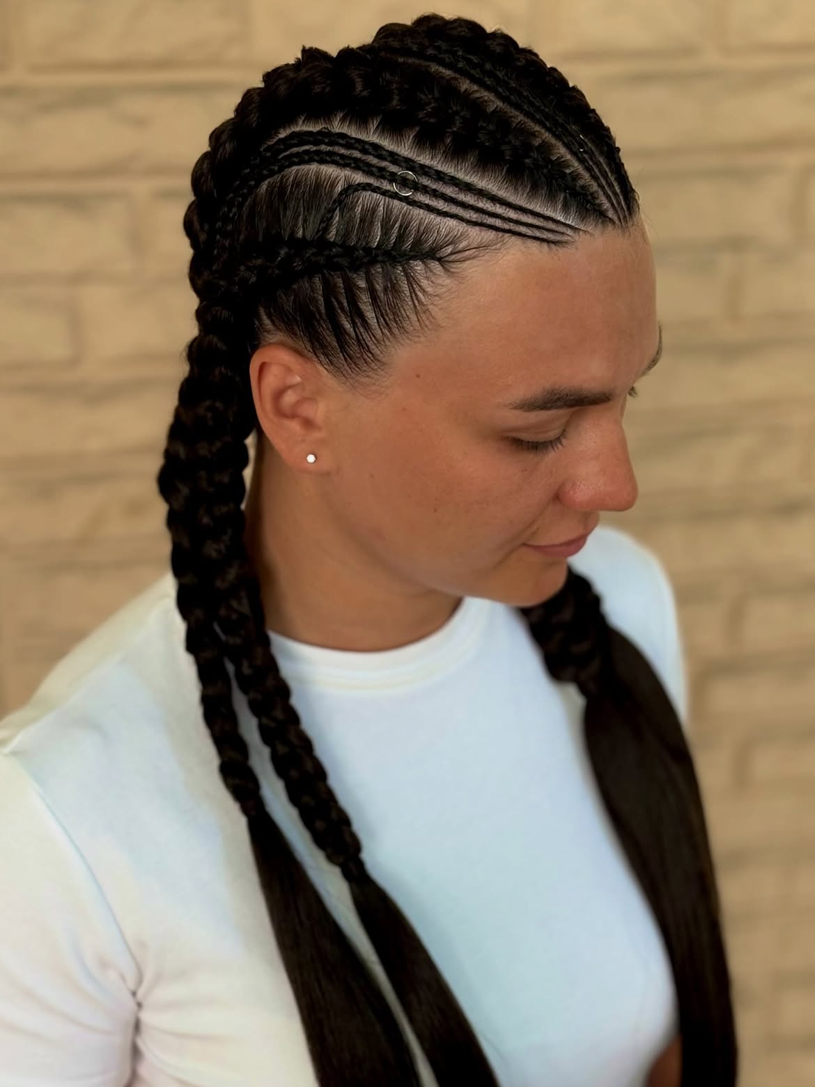 Sleek Braided Pigtails With Baby Hairs