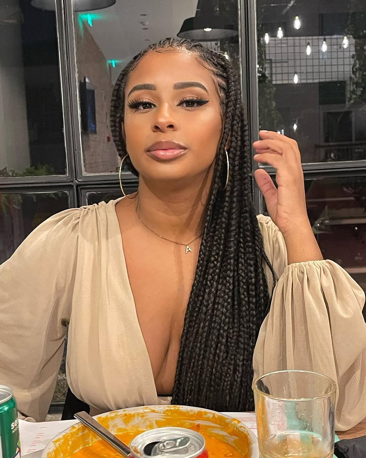 Sleek Braids With Defined Parting